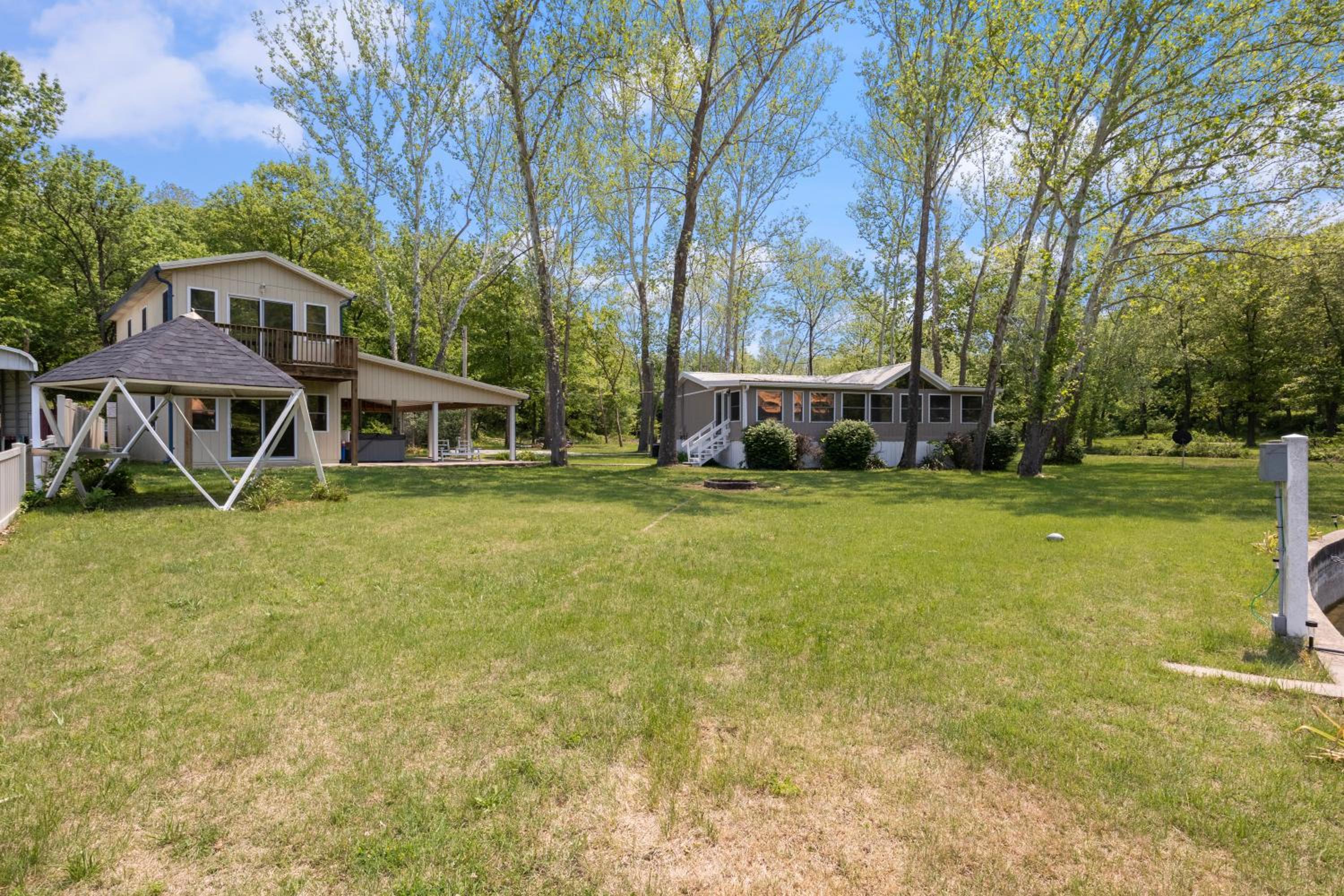 New! 2 Homes-Firepit, Hot Tub, Huge Yard and Dock