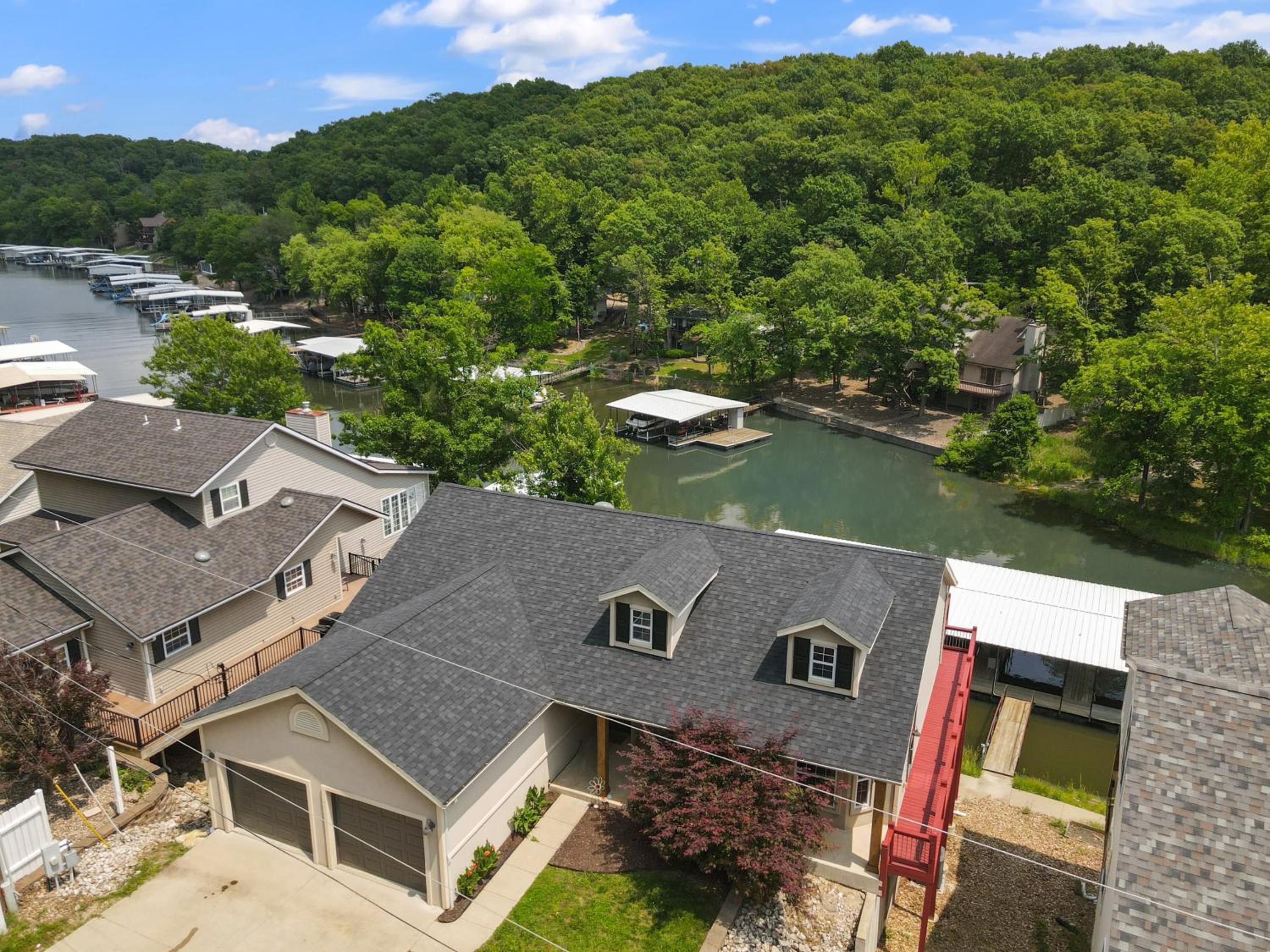 Lux Lakehouse w/ 2 Living Areas, Screened Porch & Dock Access at 22MM