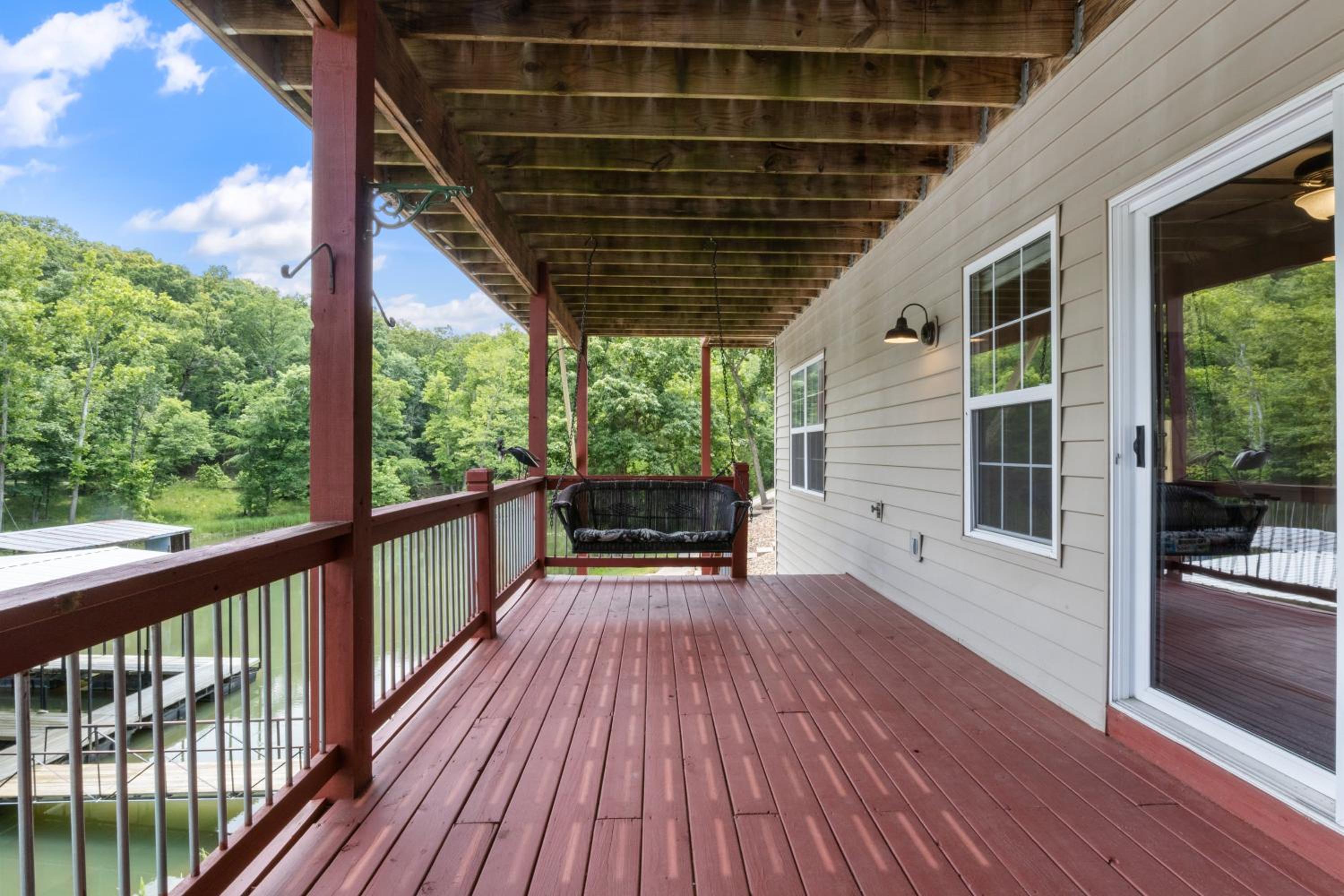 Lux Lakehouse w/ 2 Living Areas, Screened Porch & Dock Access at 22MM