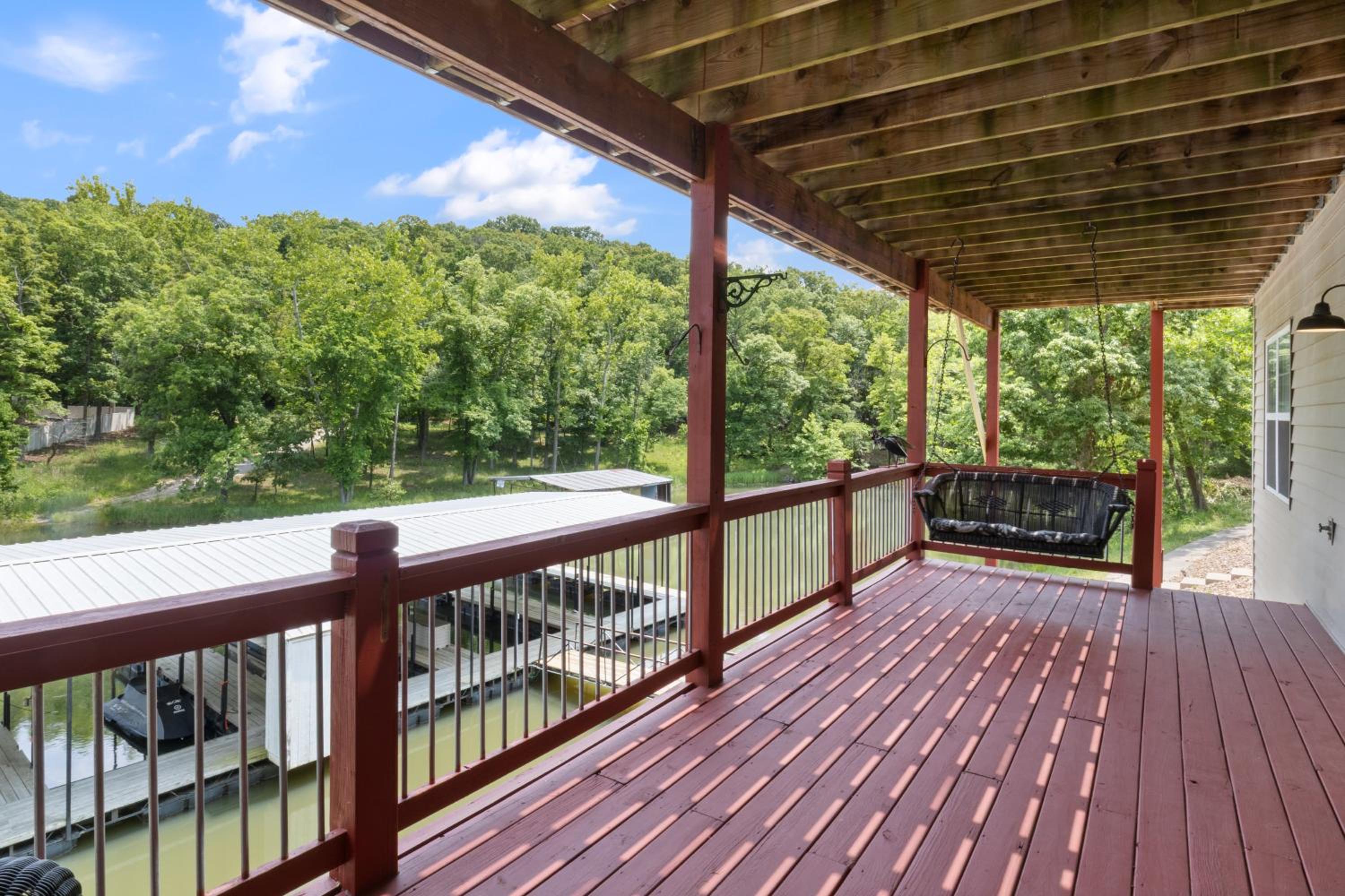 Lux Lakehouse w/ 2 Living Areas, Screened Porch & Dock Access at 22MM