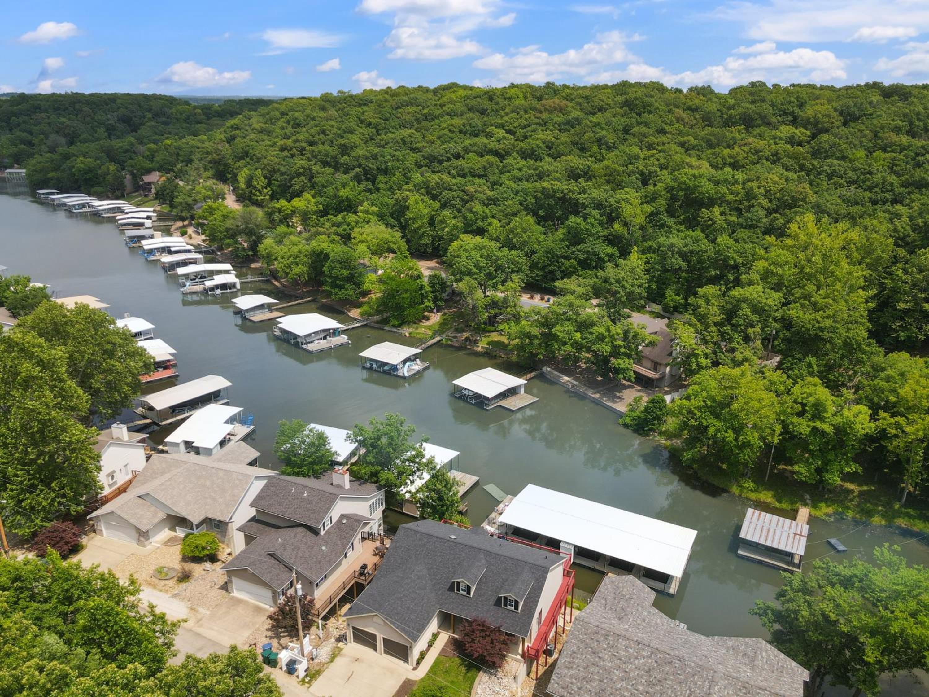 Lux Lakehouse w/ 2 Living Areas, Screened Porch & Dock Access at 22MM