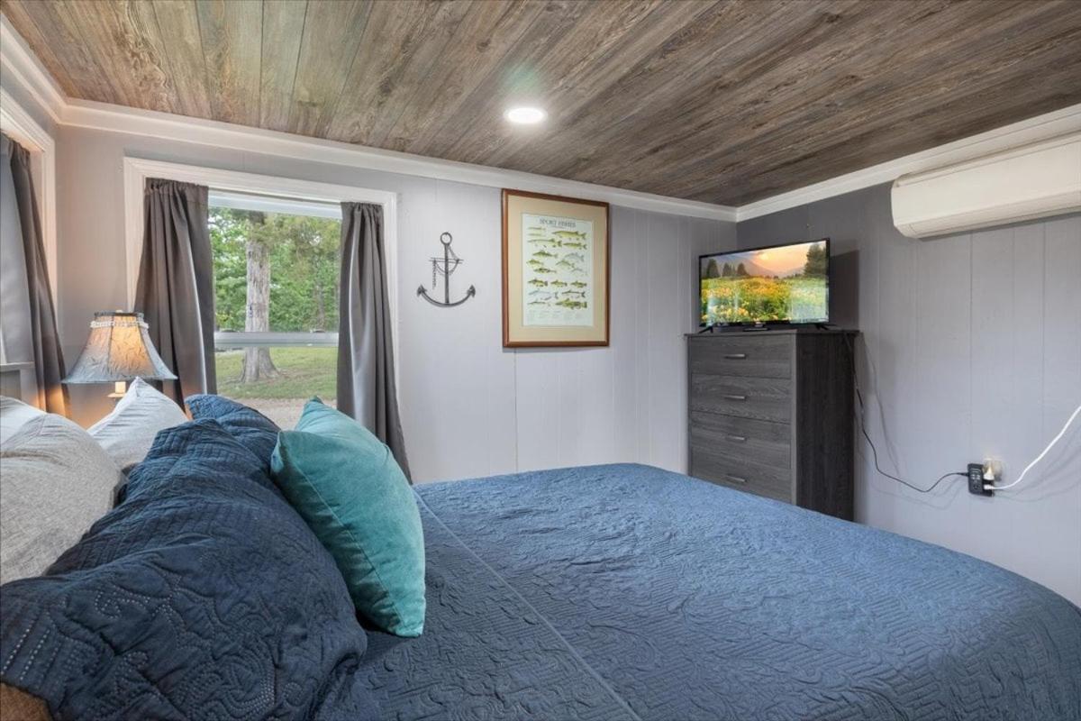 Lakefront Fishing Retreat w/ Dock, Hot Tub & Deck Views
