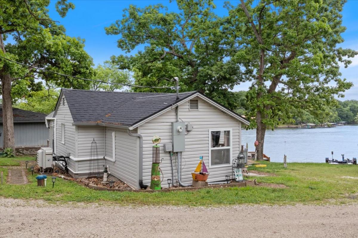 Lakefront Fishing Retreat w/ Dock, Hot Tub & Deck Views