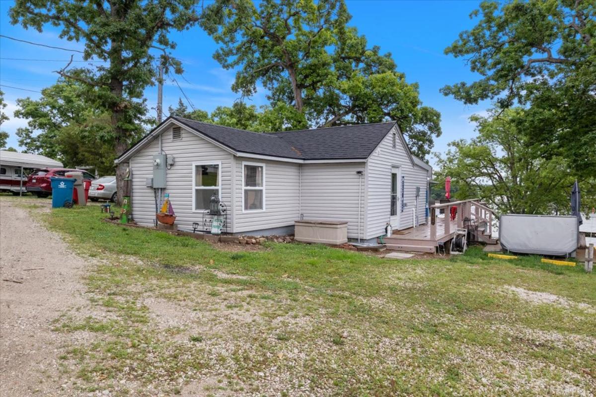 Lakefront Fishing Retreat w/ Dock, Hot Tub & Deck Views