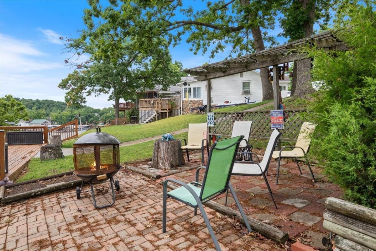 Lakefront Fishing Retreat w/ Dock, Hot Tub & Deck Views