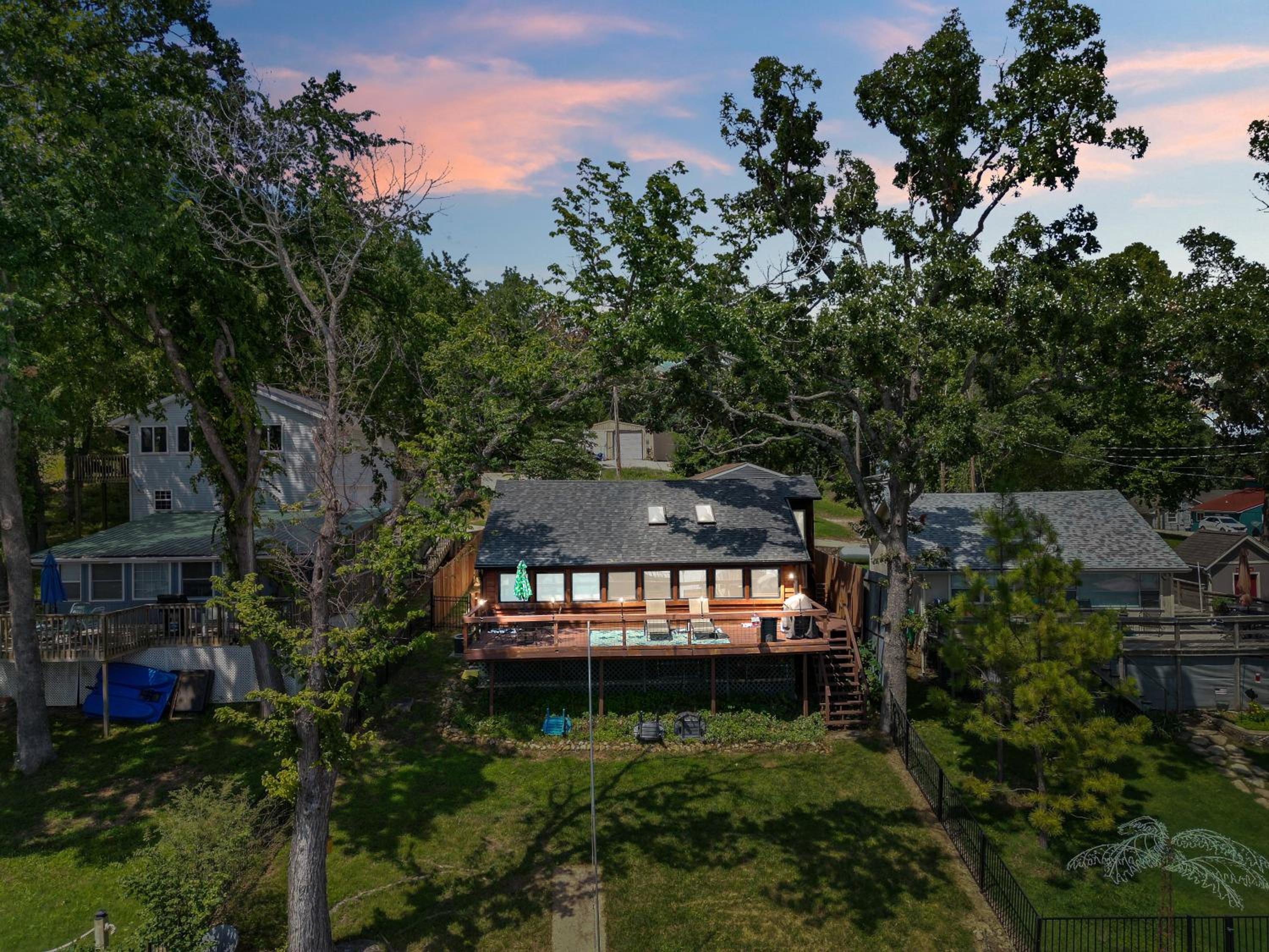 Pet-Friendly Lakefront Home in a Quiet Cove w/ Netflix, Outdoor Seating, Boat Slip