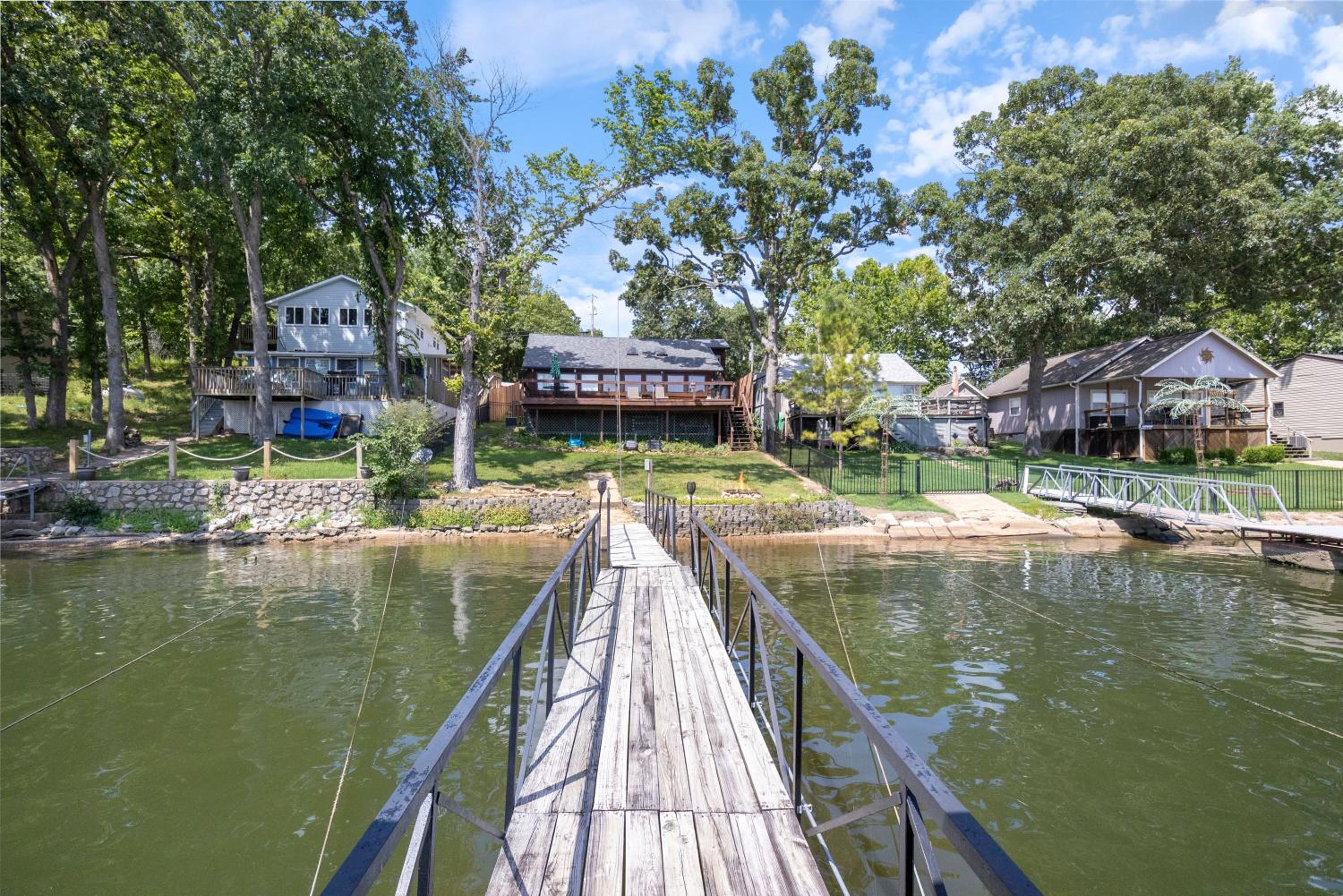 Pet-Friendly Lakefront Home in a Quiet Cove w/ Netflix, Outdoor Seating, Boat Slip