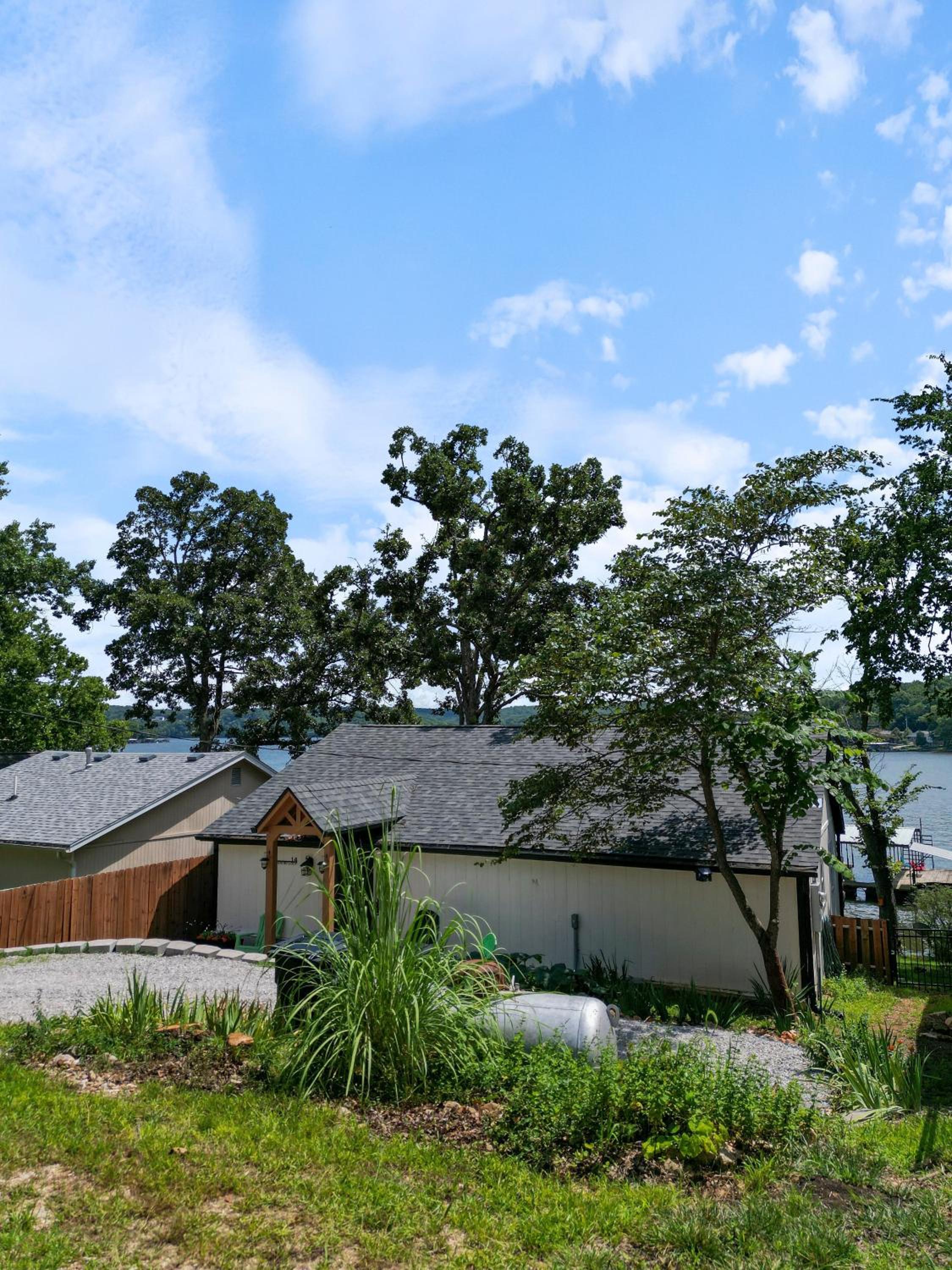 Pet-Friendly Lakefront Home in a Quiet Cove w/ Netflix, Outdoor Seating, Boat Slip