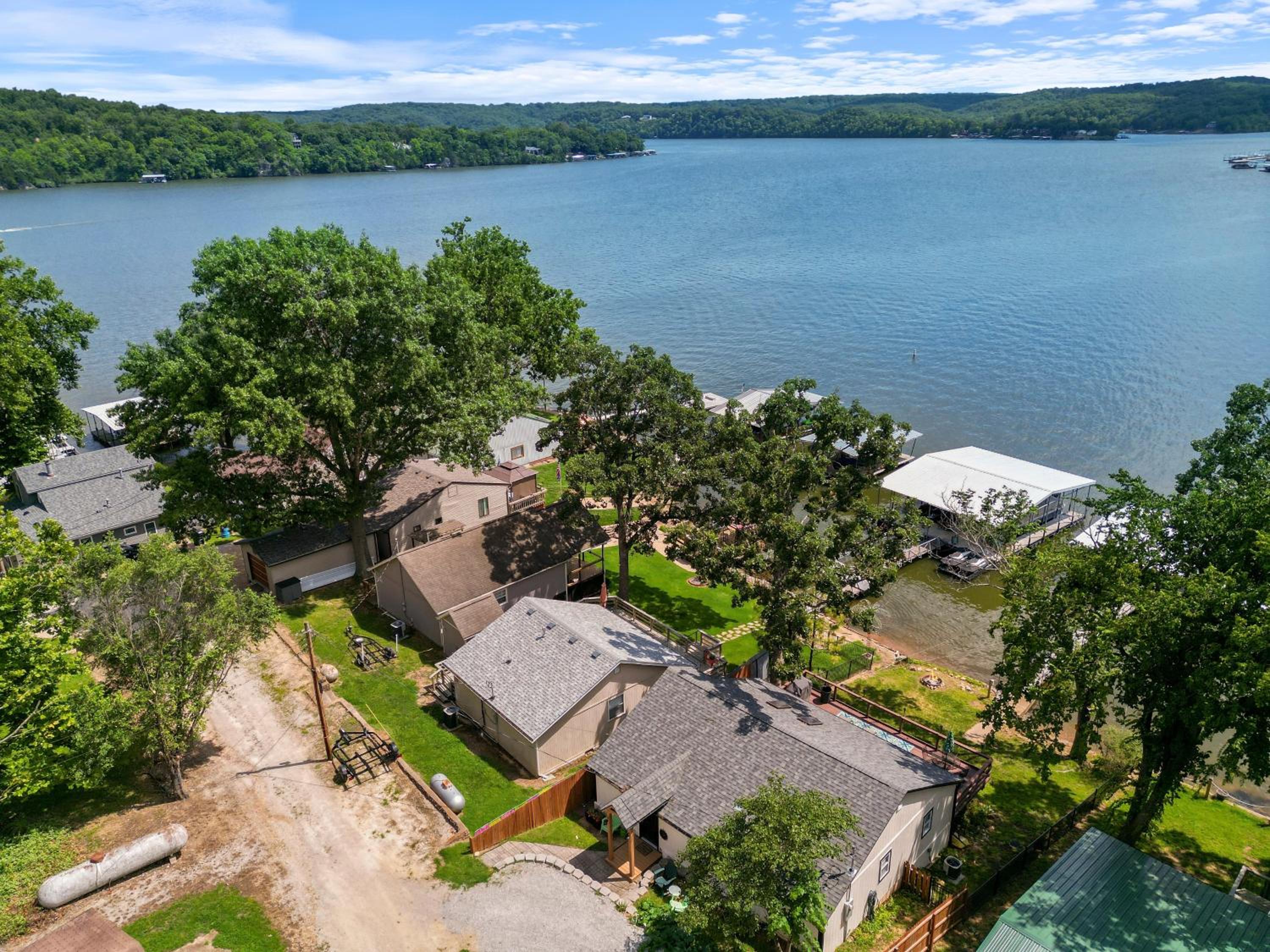Pet-Friendly Lakefront Home in a Quiet Cove w/ Netflix, Outdoor Seating, Boat Slip