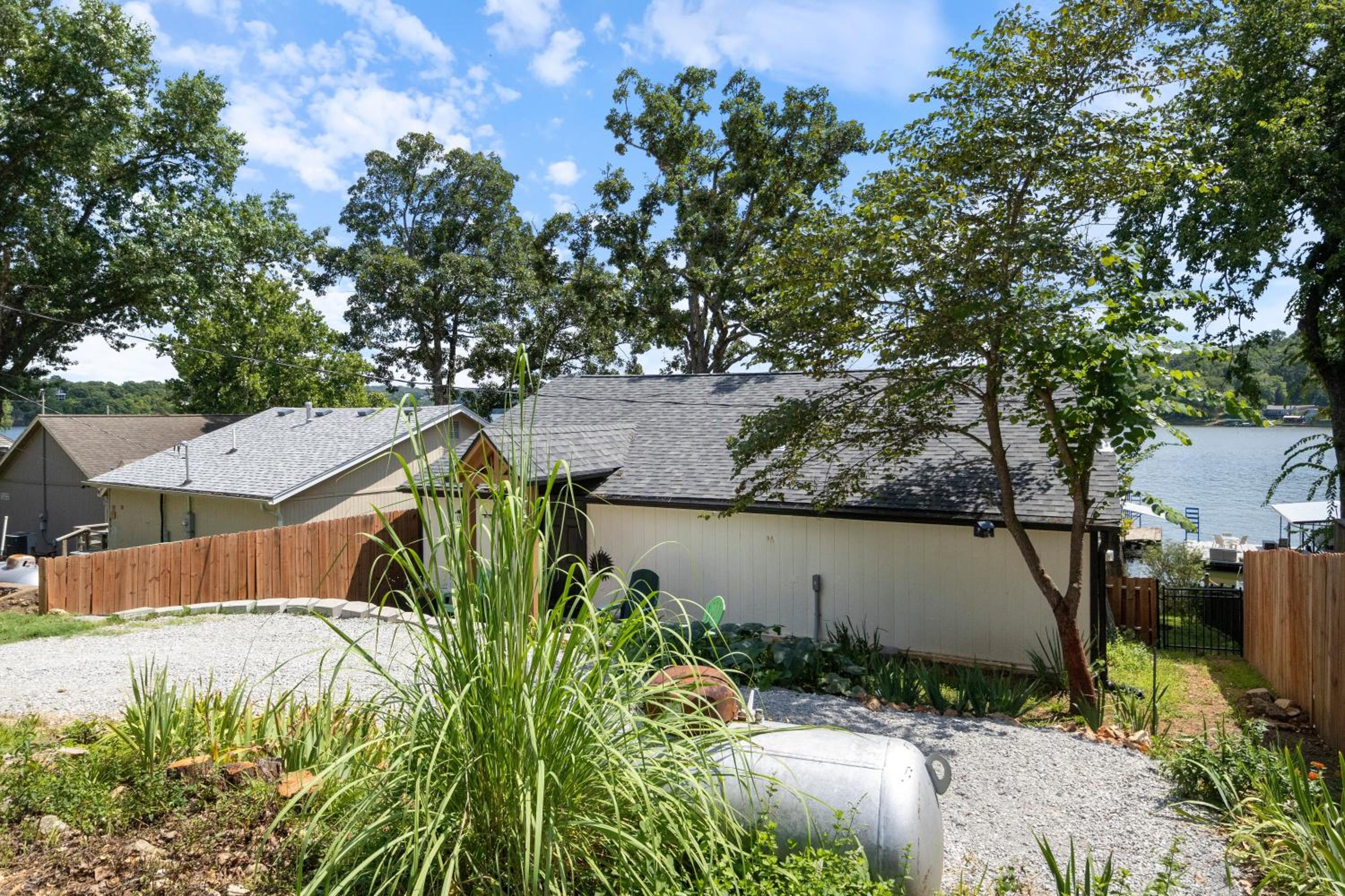 Pet-Friendly Lakefront Home in a Quiet Cove w/ Netflix, Outdoor Seating, Boat Slip