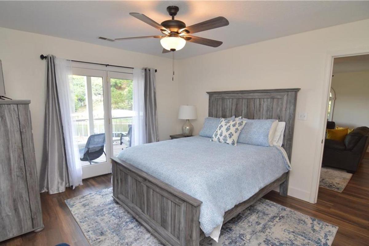Newly Updated in a Private Cove, with Firepit, Flat Lawn, Dock, Boat Slip & Kayaks in Osage Beach