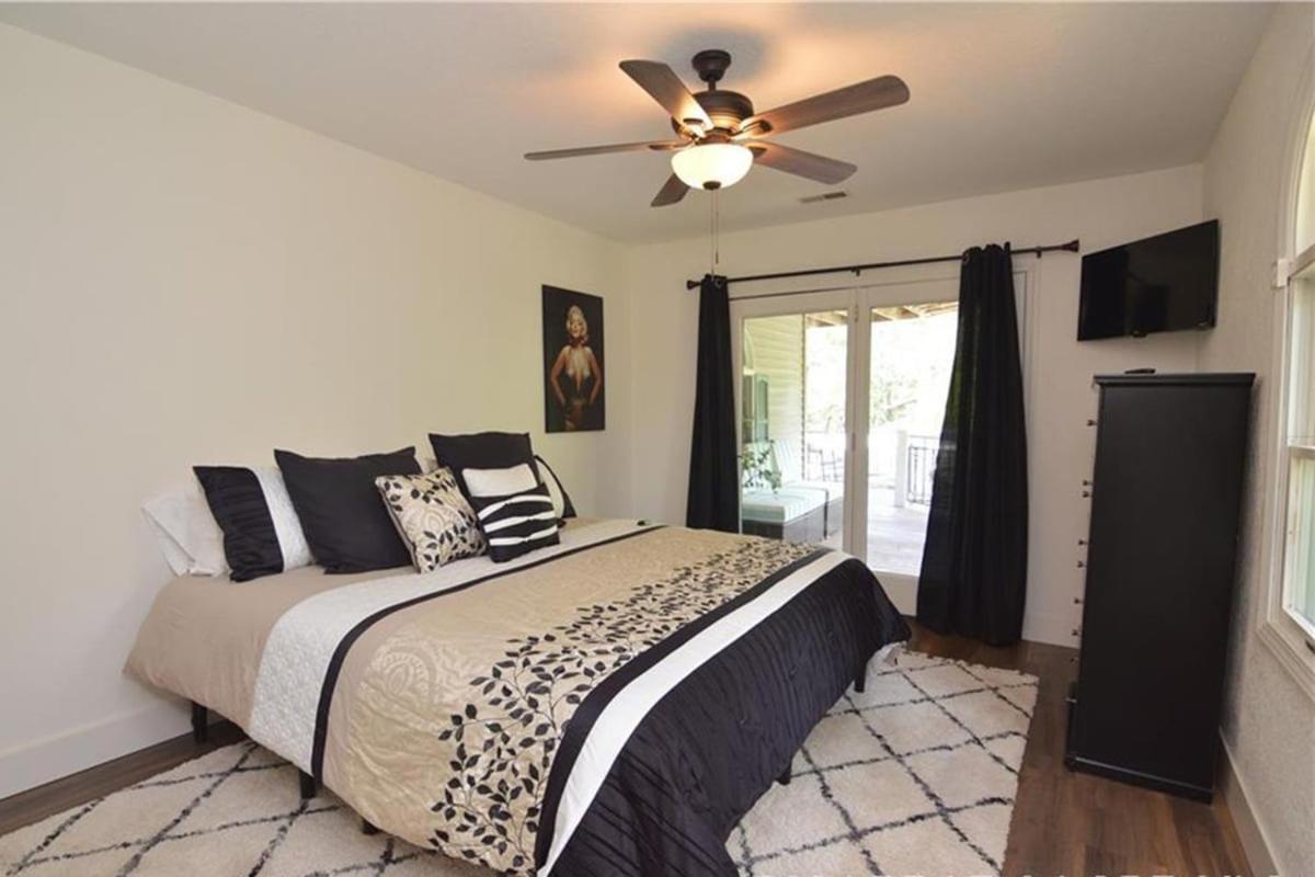 Newly Updated in a Private Cove, with Firepit, Flat Lawn, Dock, Boat Slip & Kayaks in Osage Beach
