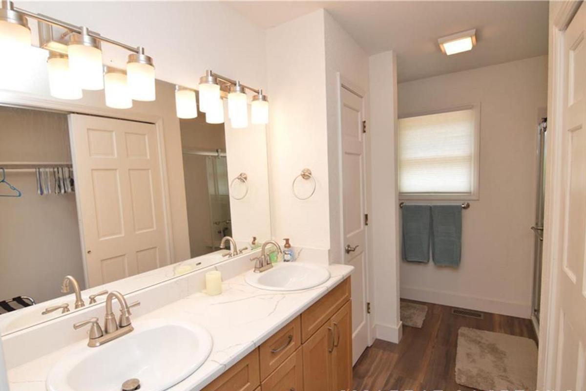 Newly Updated in a Private Cove, with Firepit, Flat Lawn, Dock, Boat Slip & Kayaks in Osage Beach