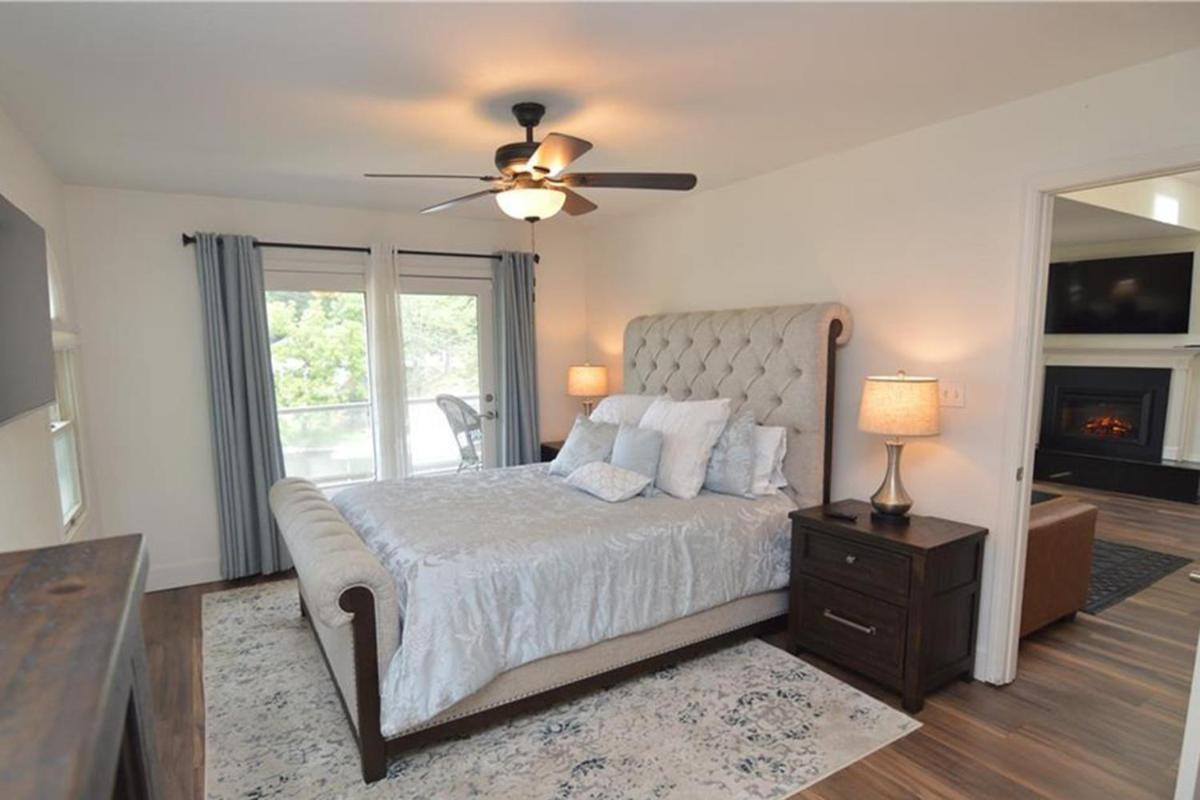 Newly Updated in a Private Cove, with Firepit, Flat Lawn, Dock, Boat Slip & Kayaks in Osage Beach