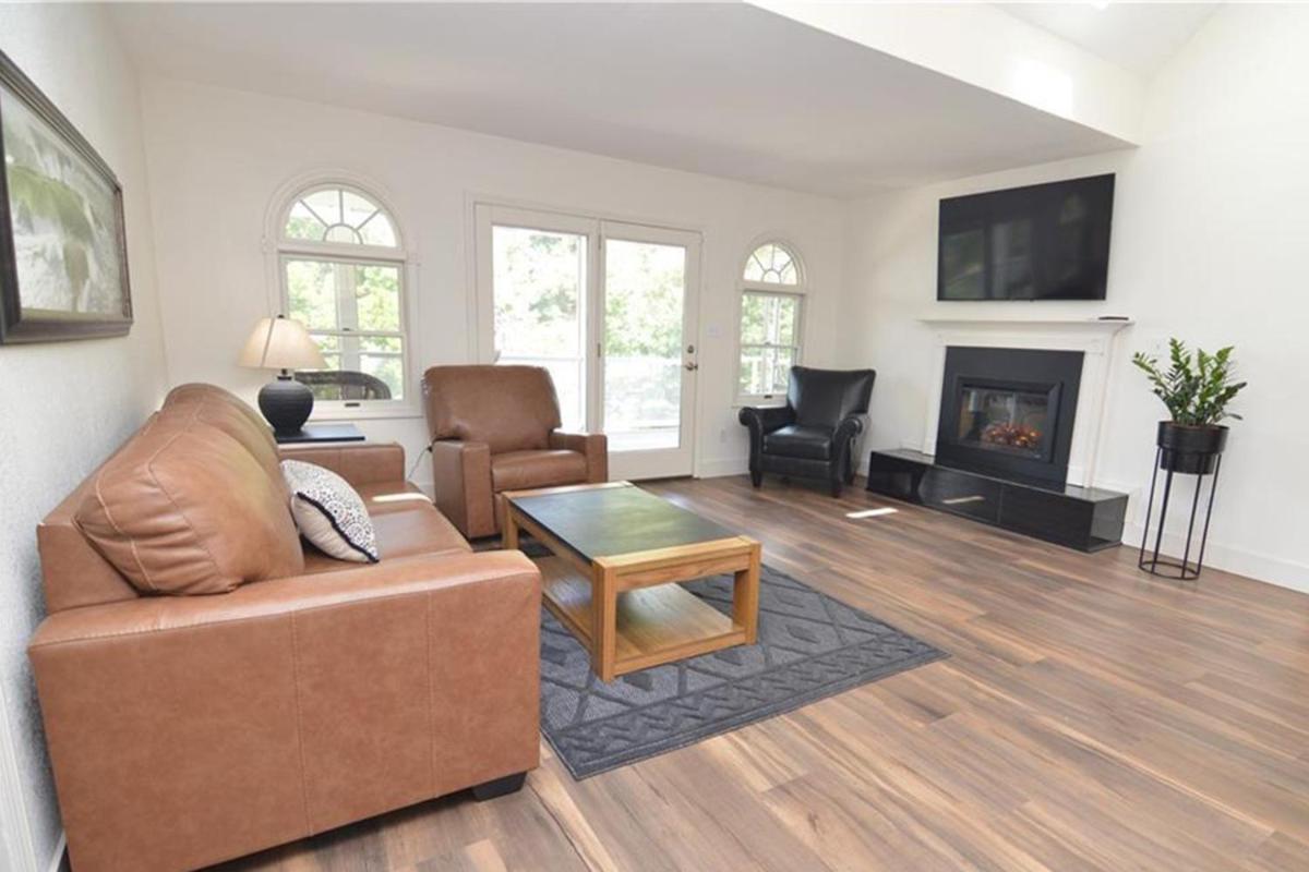 Newly Updated in a Private Cove, with Firepit, Flat Lawn, Dock, Boat Slip & Kayaks in Osage Beach