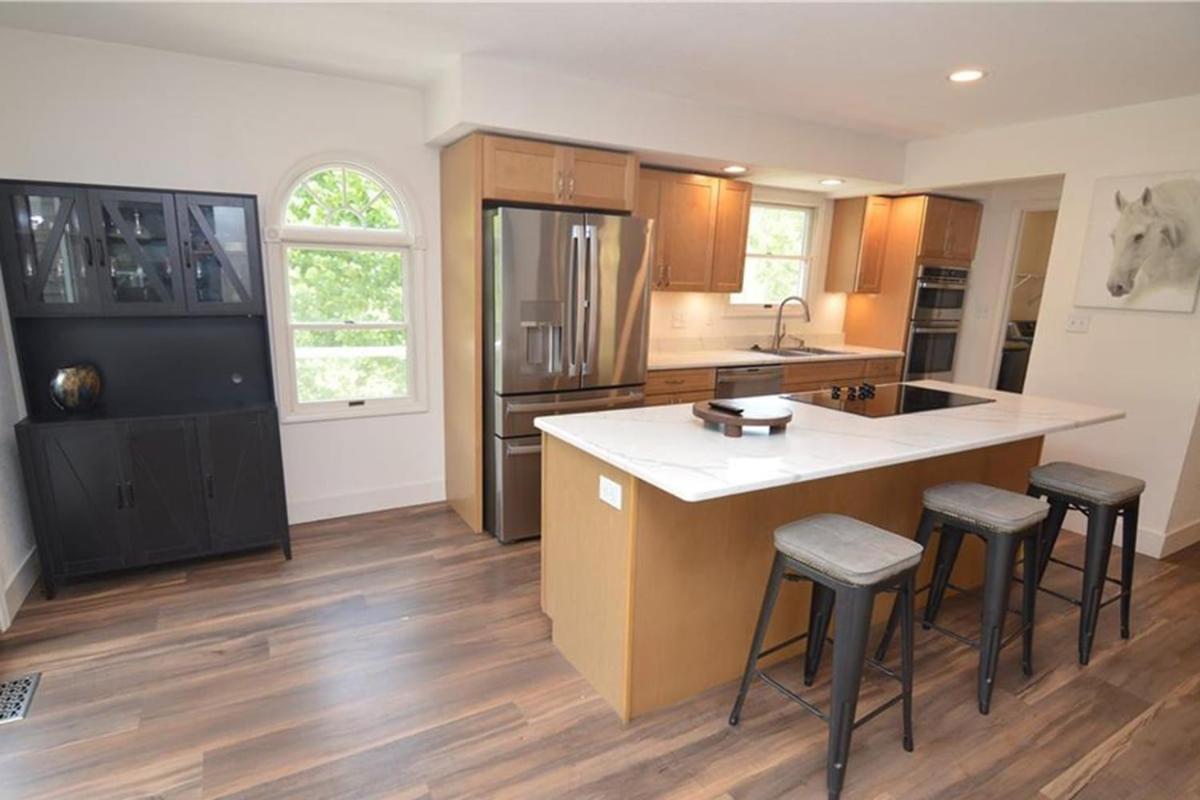 Newly Updated in a Private Cove, with Firepit, Flat Lawn, Dock, Boat Slip & Kayaks in Osage Beach