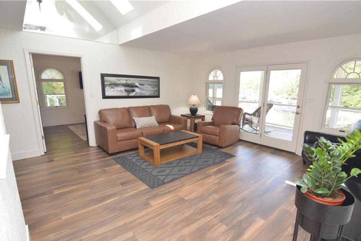Newly Updated in a Private Cove, with Firepit, Flat Lawn, Dock, Boat Slip & Kayaks in Osage Beach