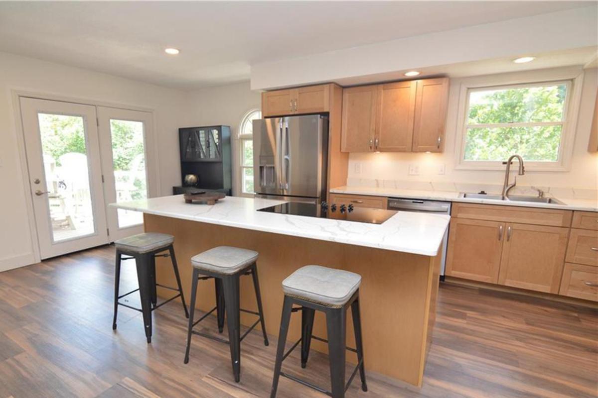 Newly Updated in a Private Cove, with Firepit, Flat Lawn, Dock, Boat Slip & Kayaks in Osage Beach