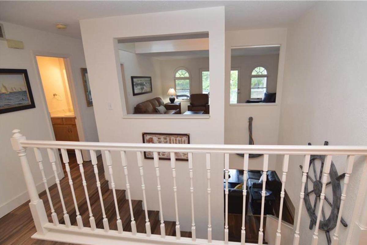 Newly Updated in a Private Cove, with Firepit, Flat Lawn, Dock, Boat Slip & Kayaks in Osage Beach