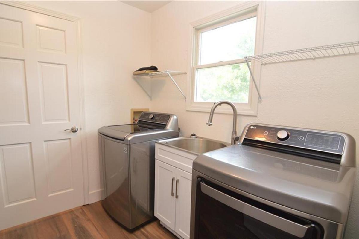 Newly Updated in a Private Cove, with Firepit, Flat Lawn, Dock, Boat Slip & Kayaks in Osage Beach
