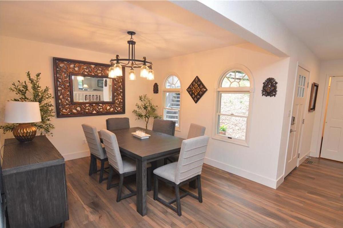 Newly Updated in a Private Cove, with Firepit, Flat Lawn, Dock, Boat Slip & Kayaks in Osage Beach