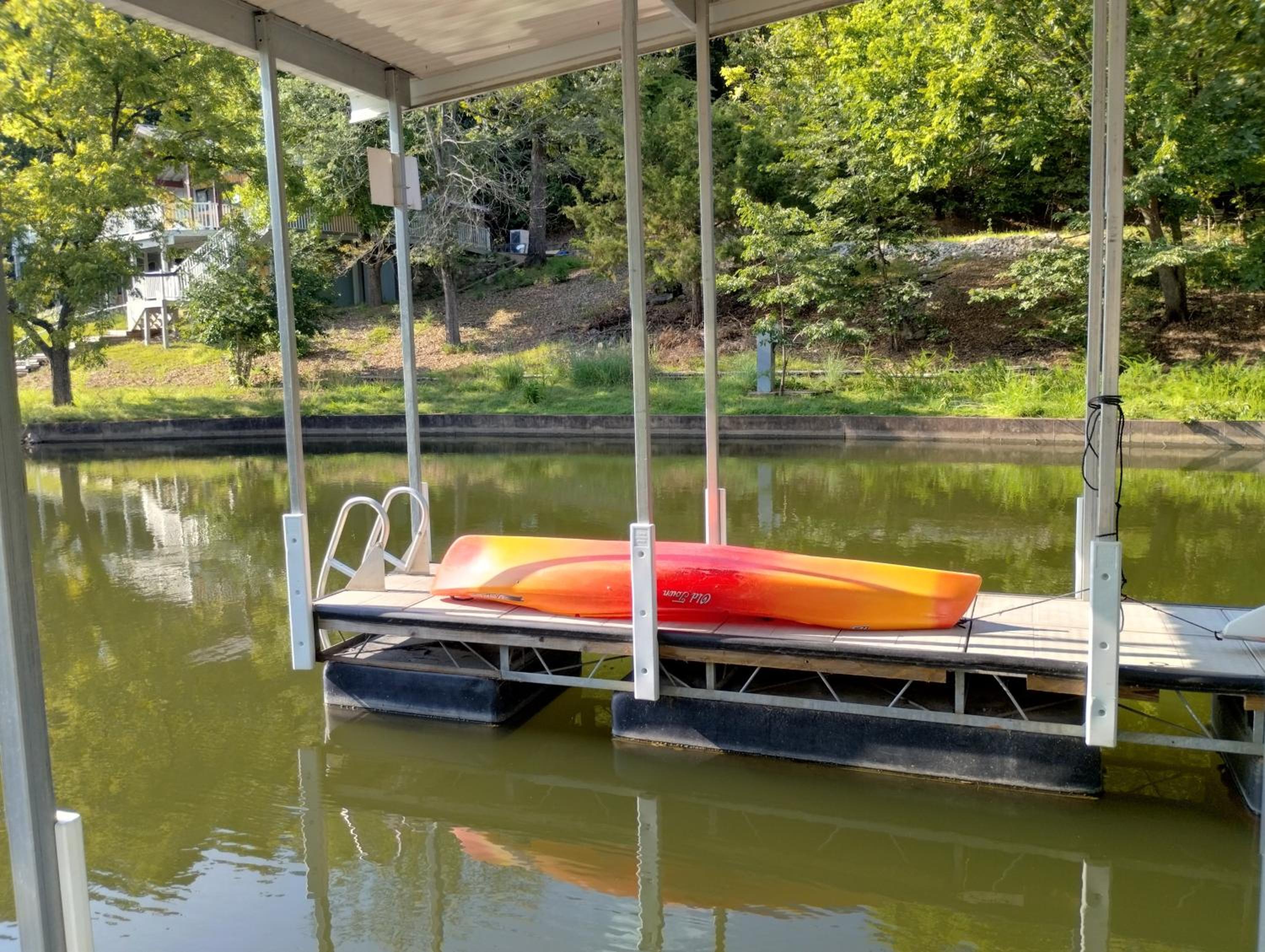 Newly Updated in a Private Cove, with Firepit, Flat Lawn, Dock, Boat Slip & Kayaks in Osage Beach