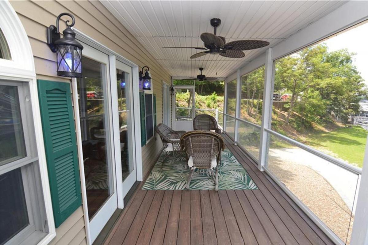 Newly Updated in a Private Cove, with Firepit, Flat Lawn, Dock, Boat Slip & Kayaks in Osage Beach