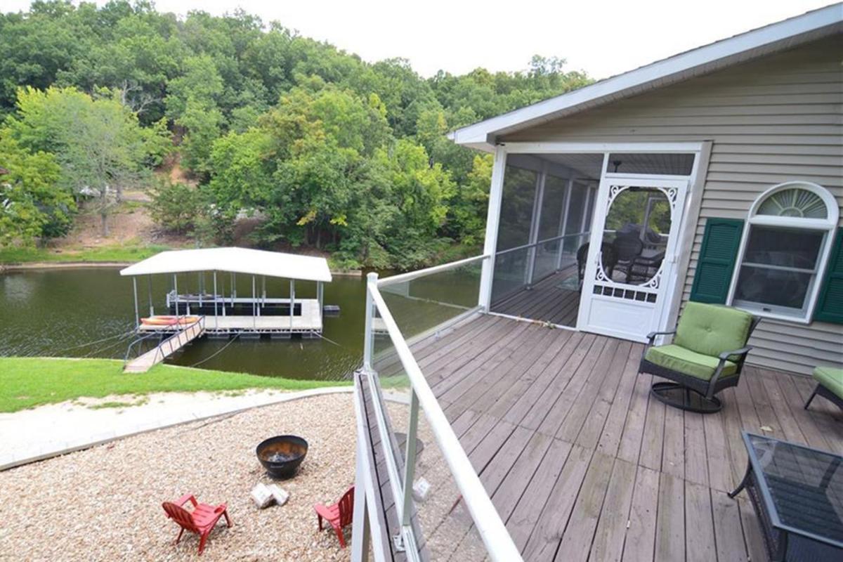 Newly Updated in a Private Cove, with Firepit, Flat Lawn, Dock, Boat Slip & Kayaks in Osage Beach