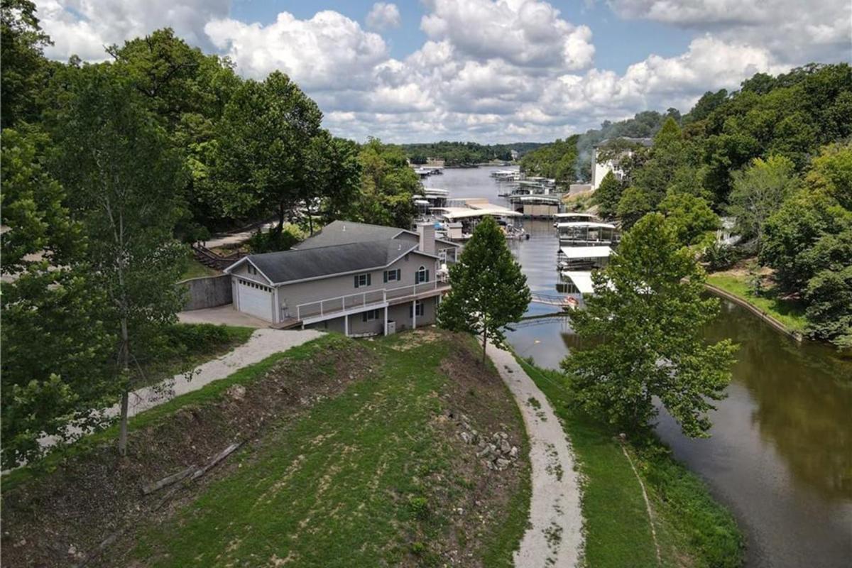 Newly Updated in a Private Cove, with Firepit, Flat Lawn, Dock, Boat Slip & Kayaks in Osage Beach