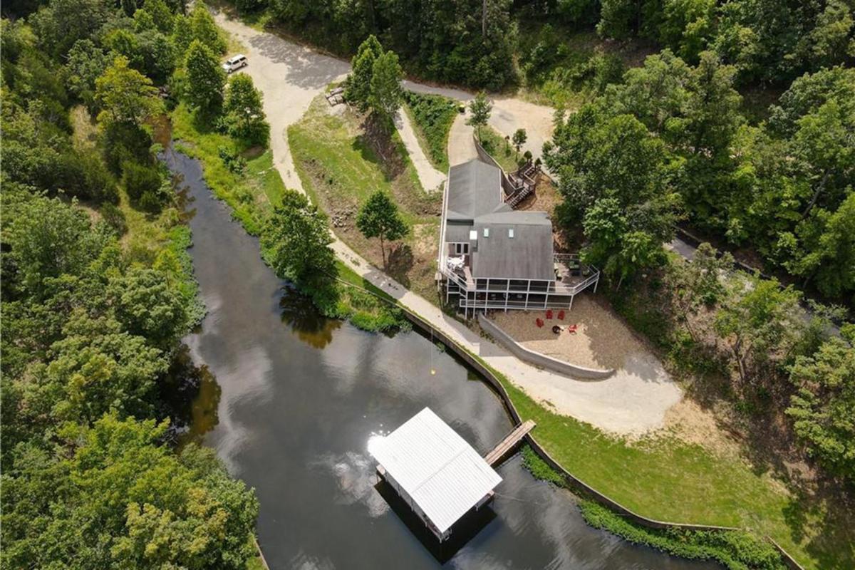 Newly Updated in a Private Cove, with Firepit, Flat Lawn, Dock, Boat Slip & Kayaks in Osage Beach