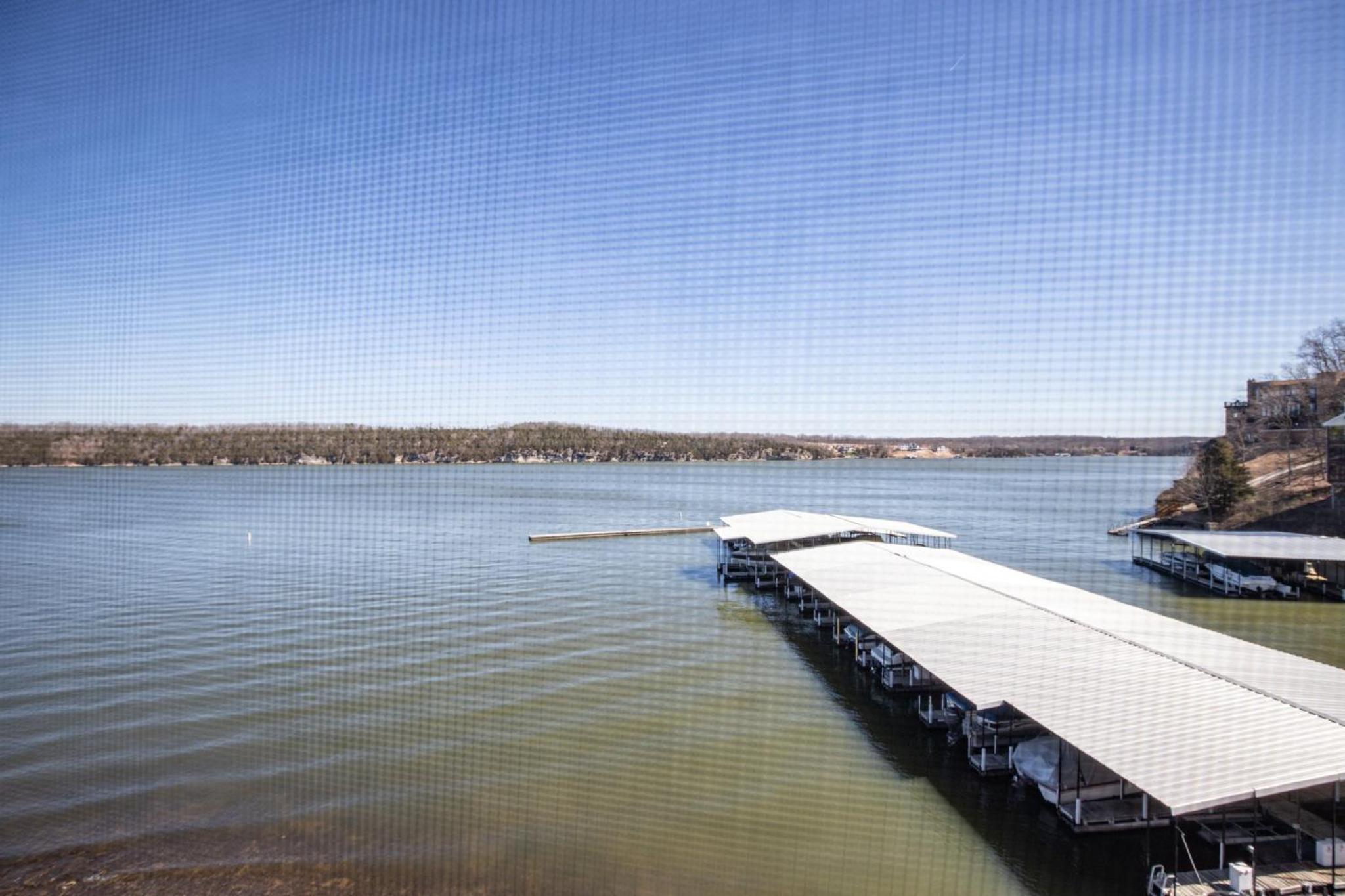 Poolside Condo with Amazing Lake Views & Design
