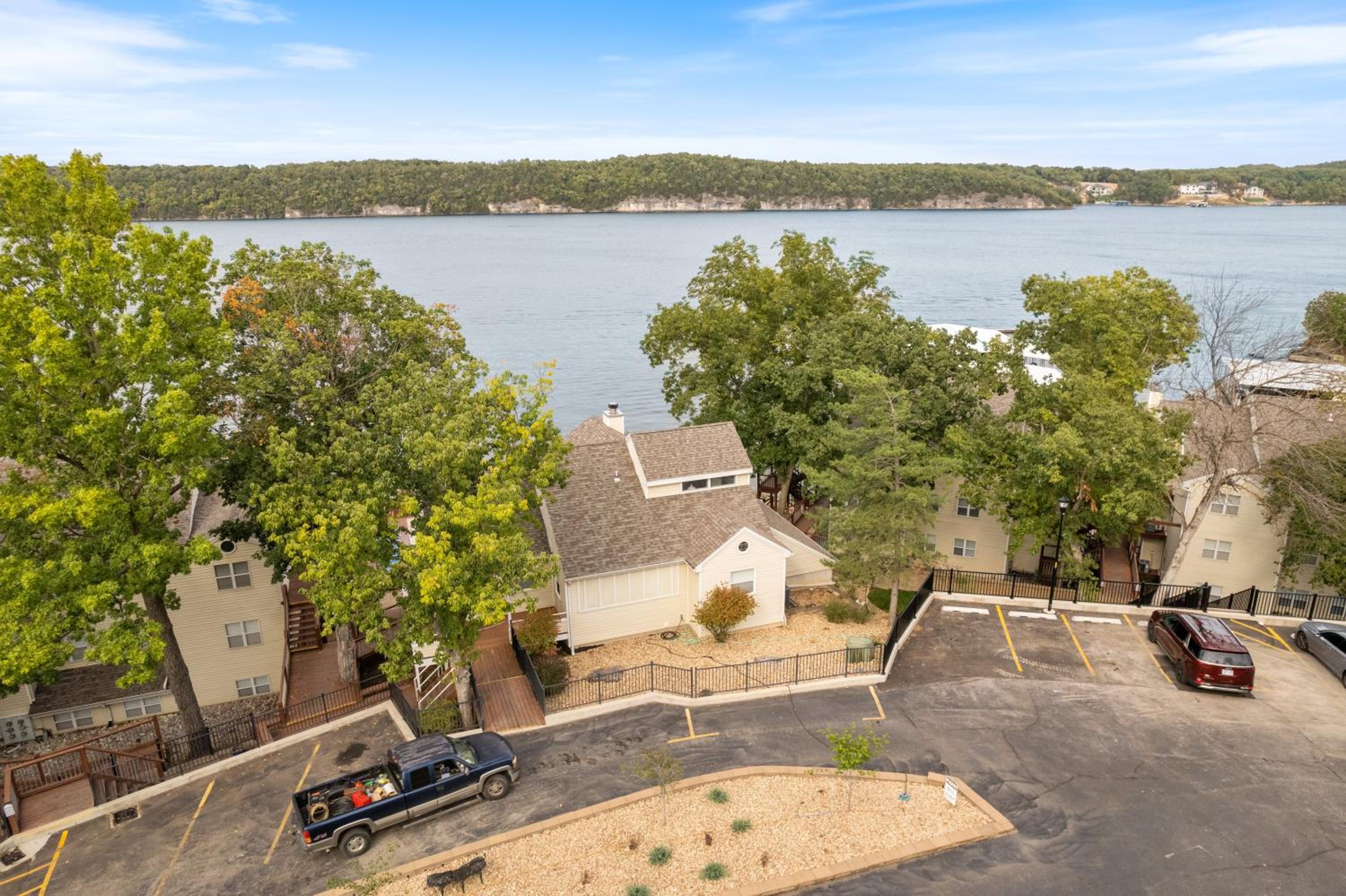 Poolside Condo with Amazing Lake Views & Design