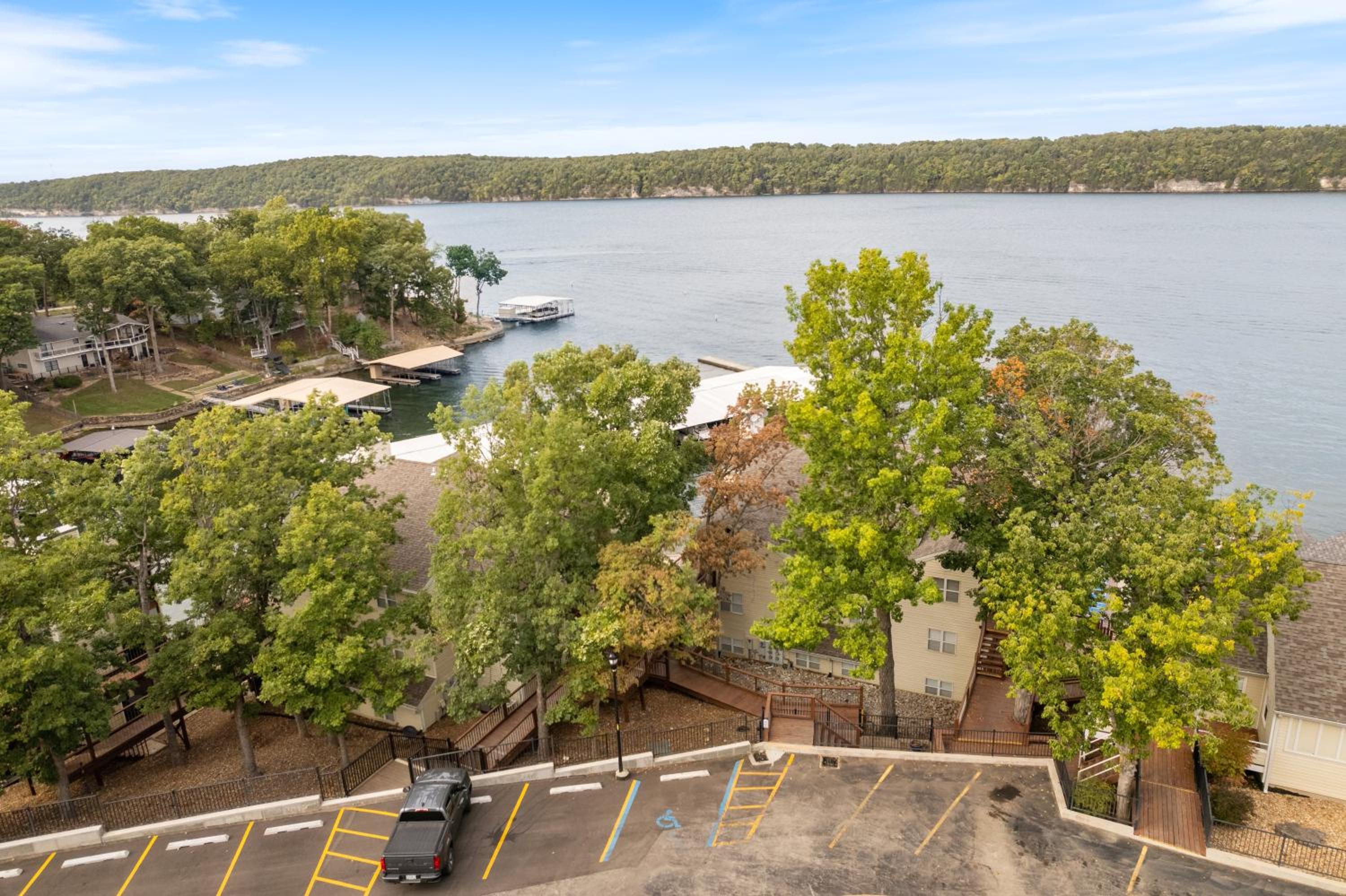 Poolside Condo with Amazing Lake Views & Design