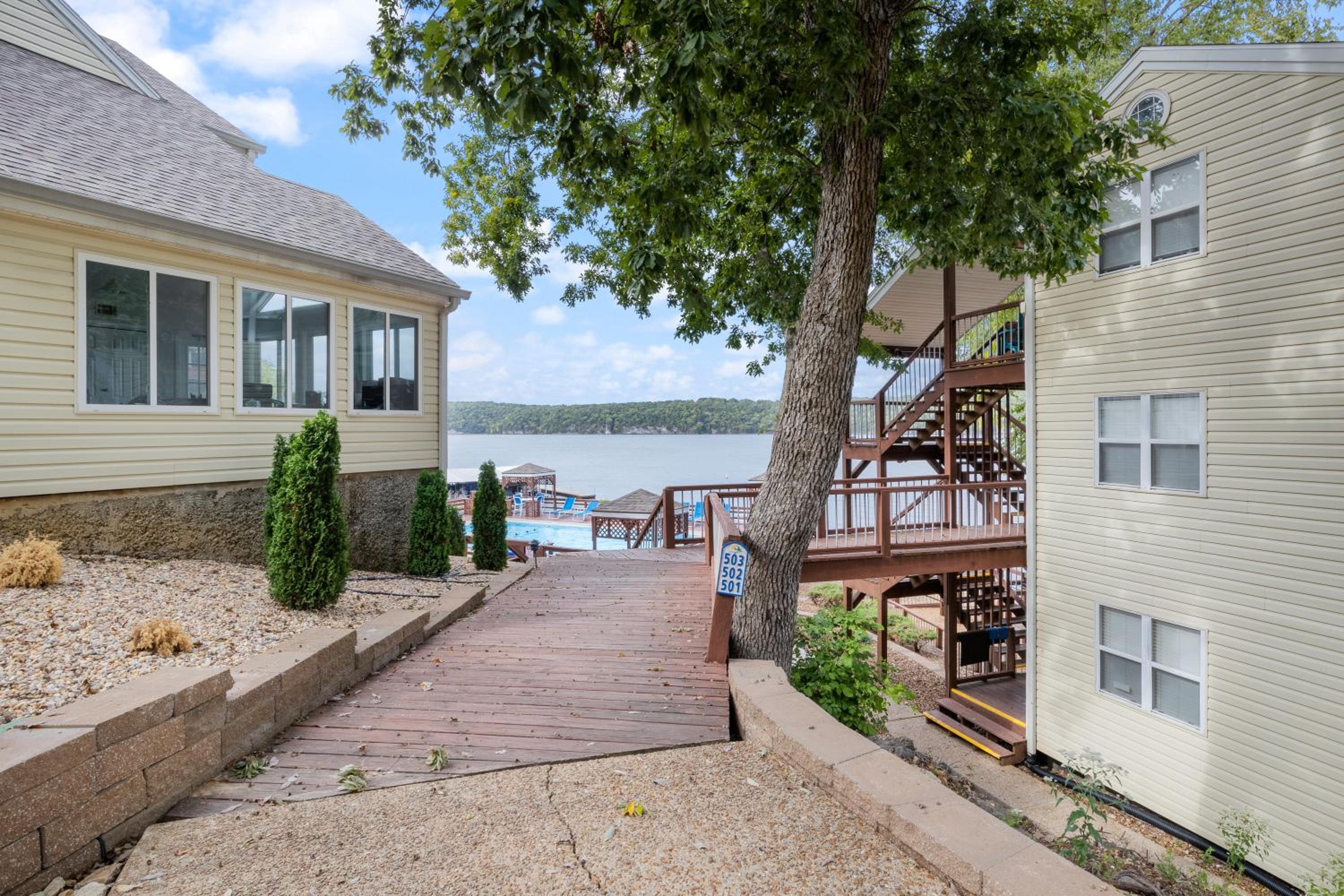 Poolside Condo with Amazing Lake Views & Design
