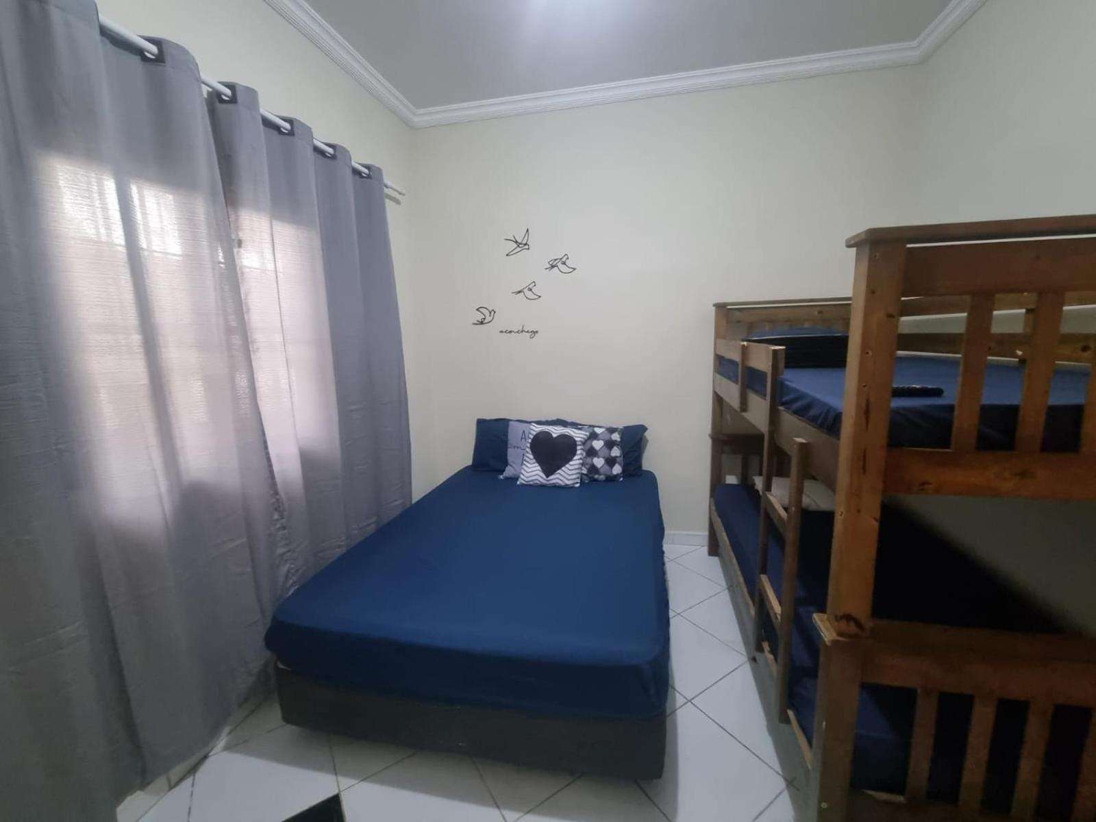Pousada II House Beach Brasil , Suites com banheiros Privativos, PISCINA com cascata e área familiar para churrasco, Garage GRATUITA, próx-praia da Aviação
