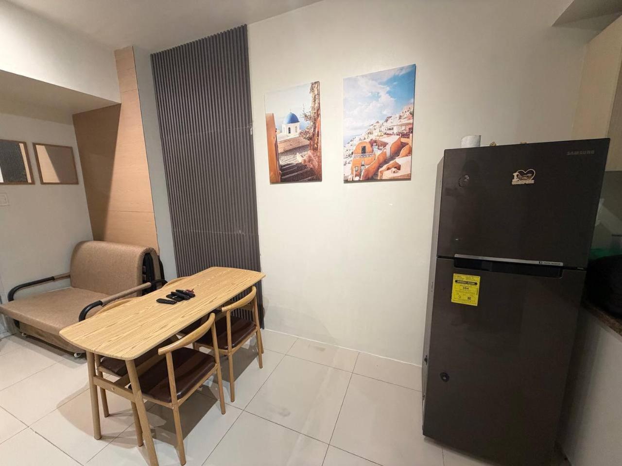 Staycation big room sm north grass residences 2 bed