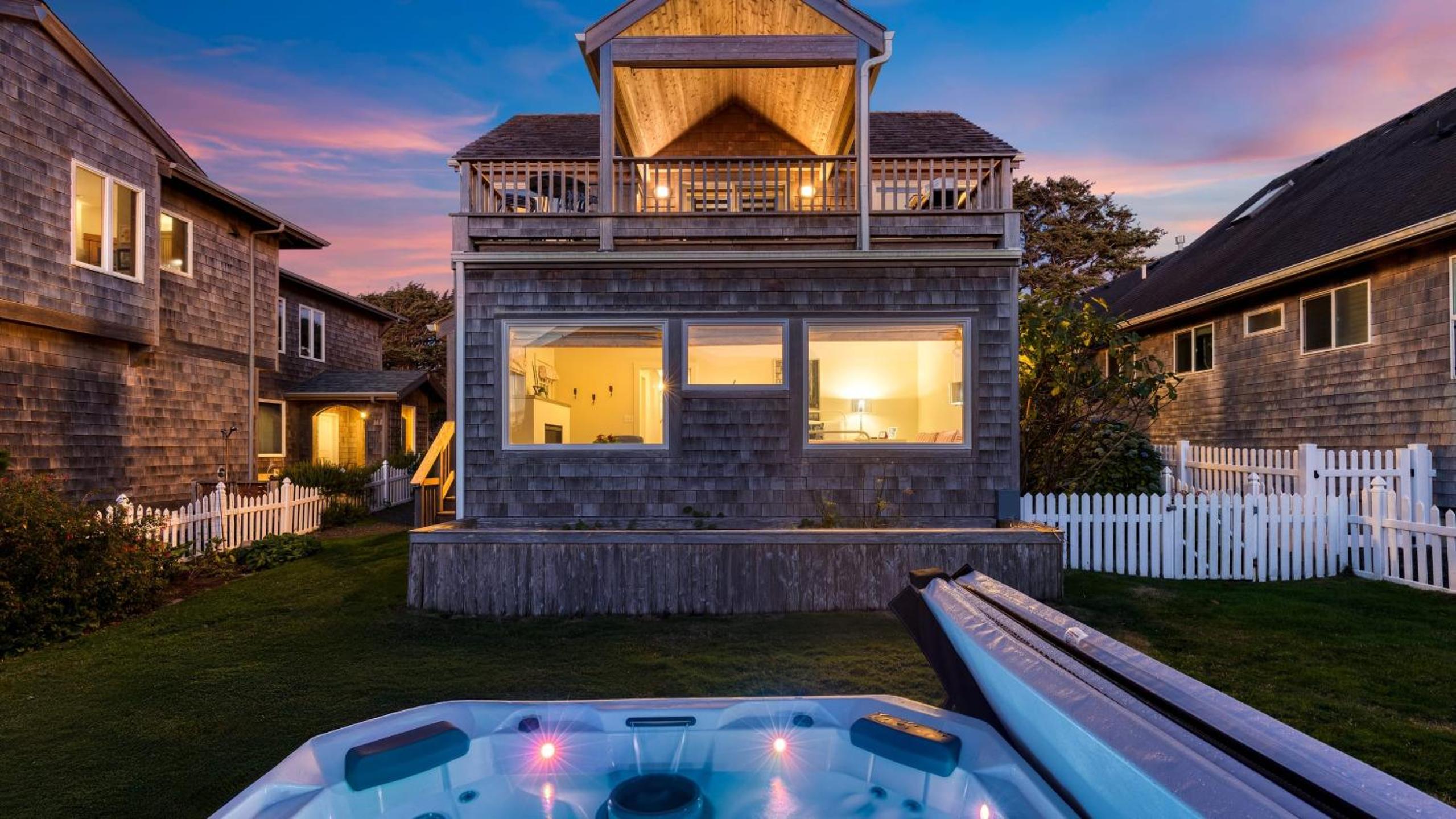 Beachside Retreat w Hot Tub Balcony Dining Blue-Ceiling Charm Sea Cured by AvantStay