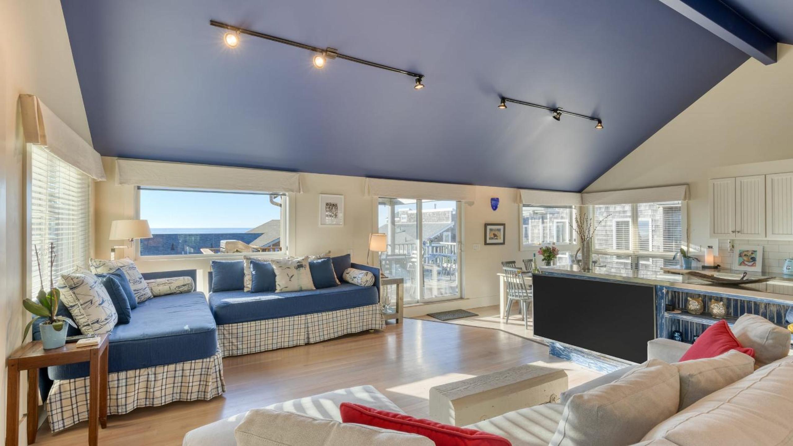 Beachside Retreat w Hot Tub Balcony Dining Blue-Ceiling Charm Sea Cured by AvantStay