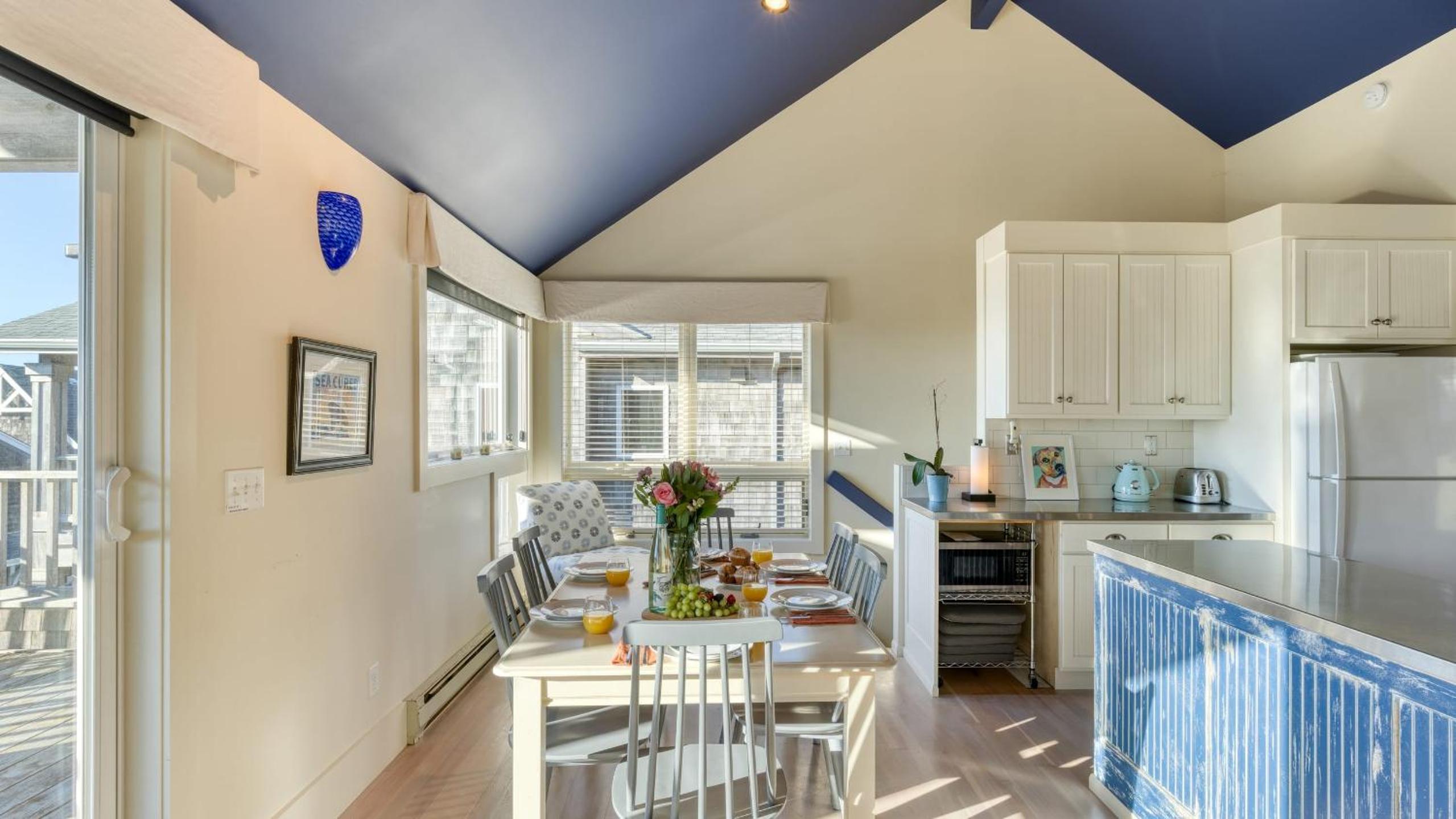 Beachside Retreat w Hot Tub Balcony Dining Blue-Ceiling Charm Sea Cured by AvantStay