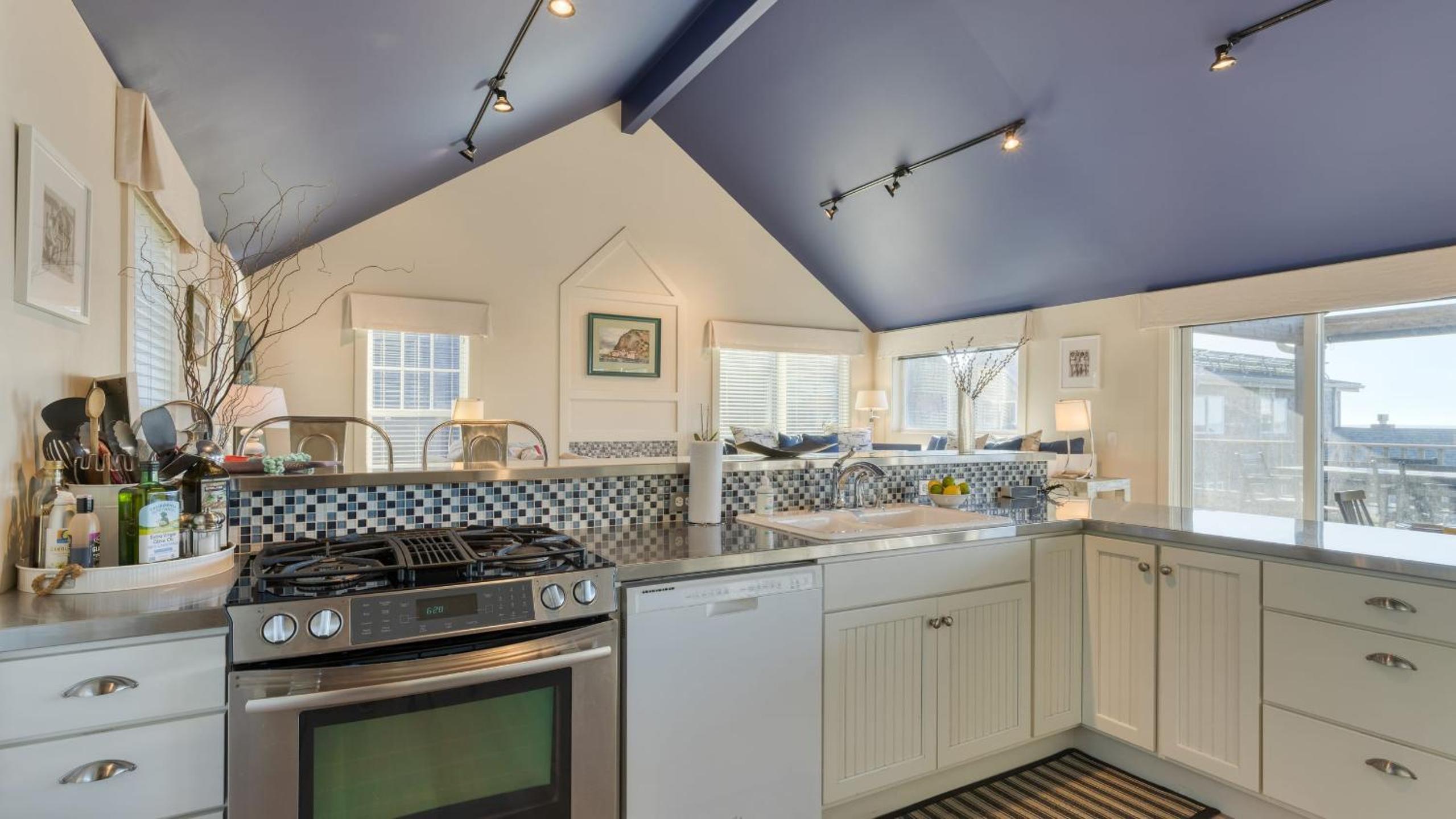 Beachside Retreat w Hot Tub Balcony Dining Blue-Ceiling Charm Sea Cured by AvantStay