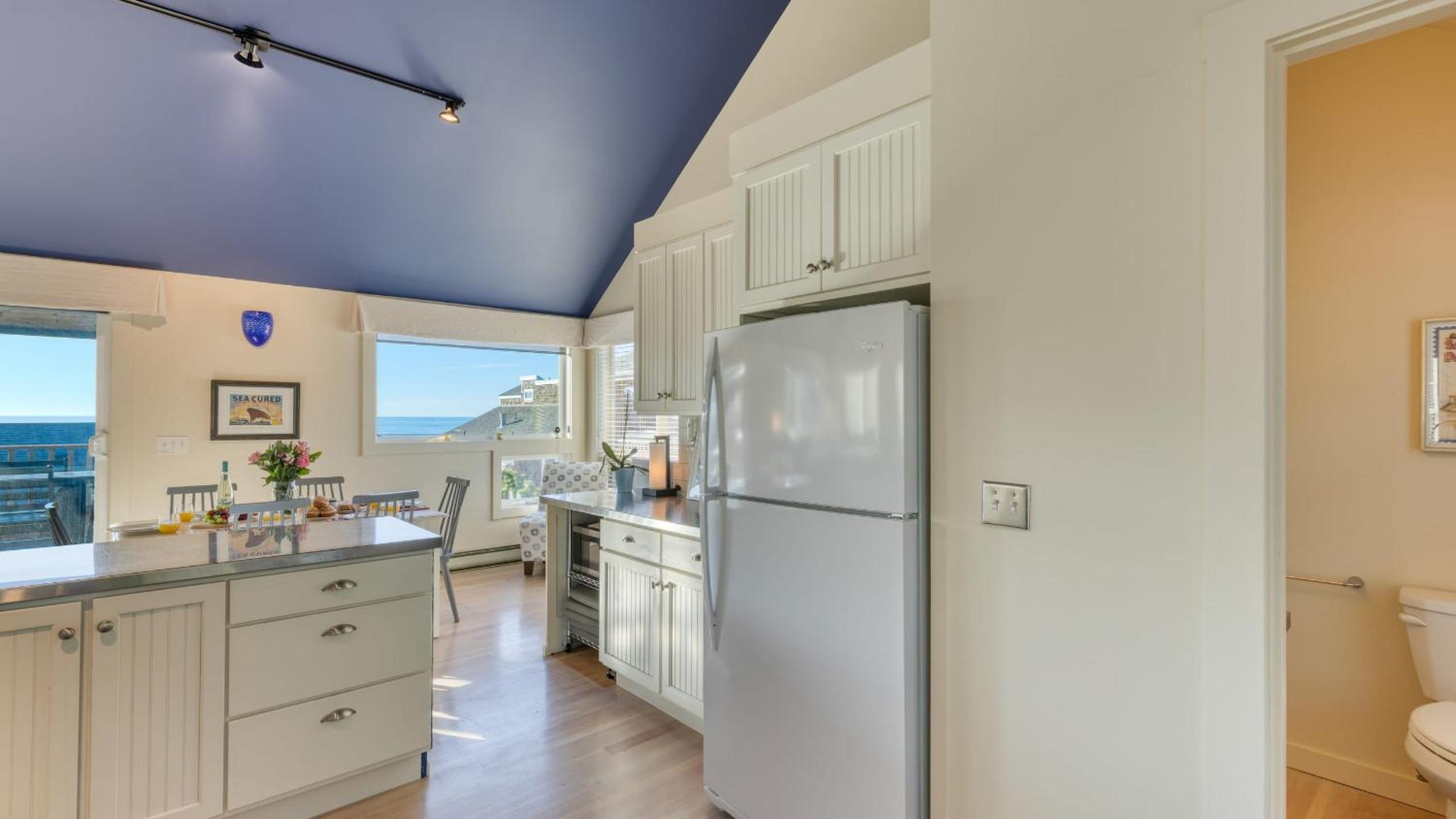 Beachside Retreat w Hot Tub Balcony Dining Blue-Ceiling Charm Sea Cured by AvantStay