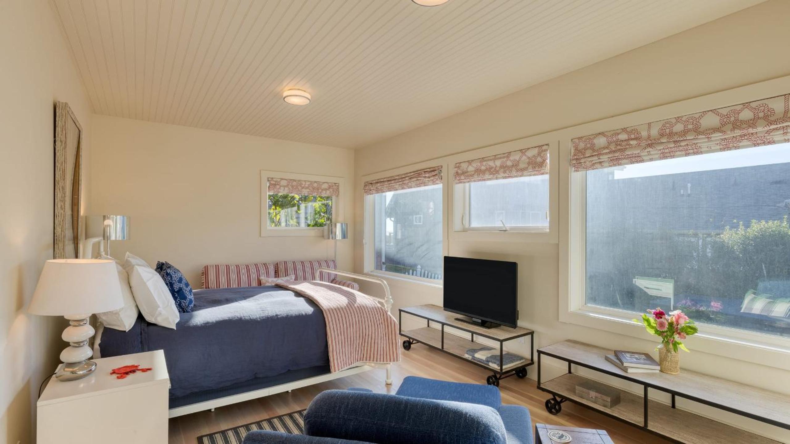 Beachside Retreat w Hot Tub Balcony Dining Blue-Ceiling Charm Sea Cured by AvantStay