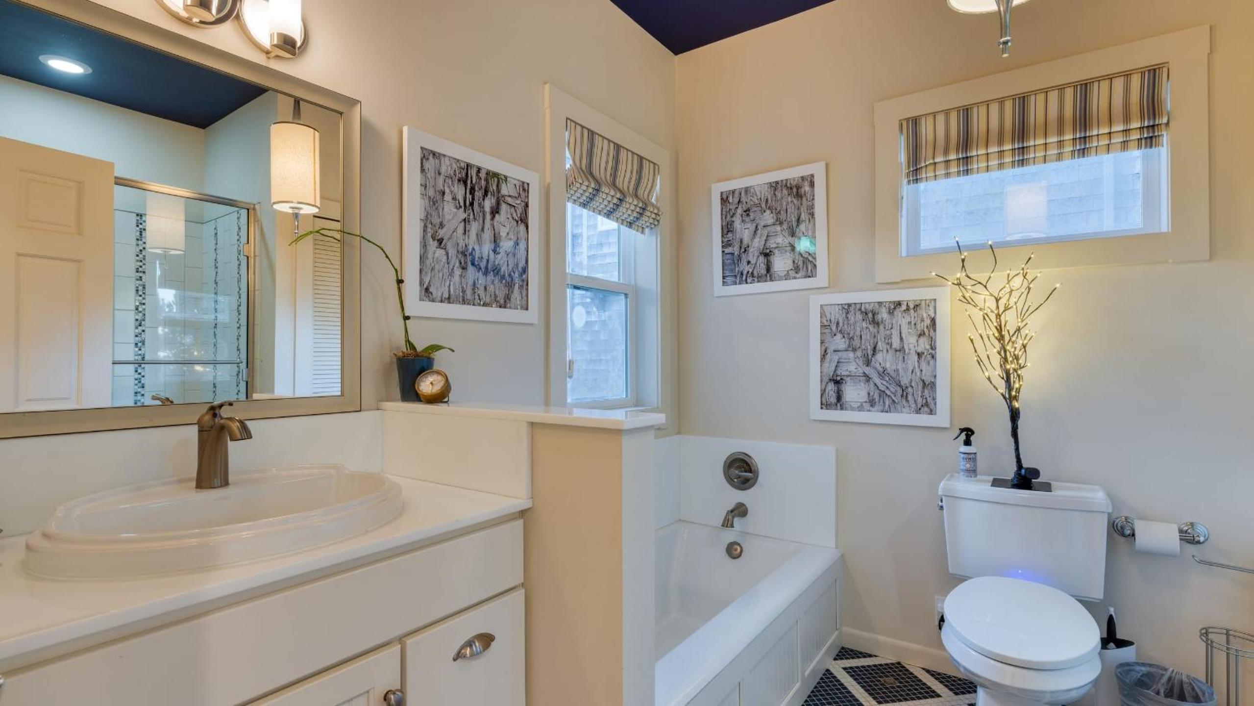 Beachside Retreat w Hot Tub Balcony Dining Blue-Ceiling Charm Sea Cured by AvantStay