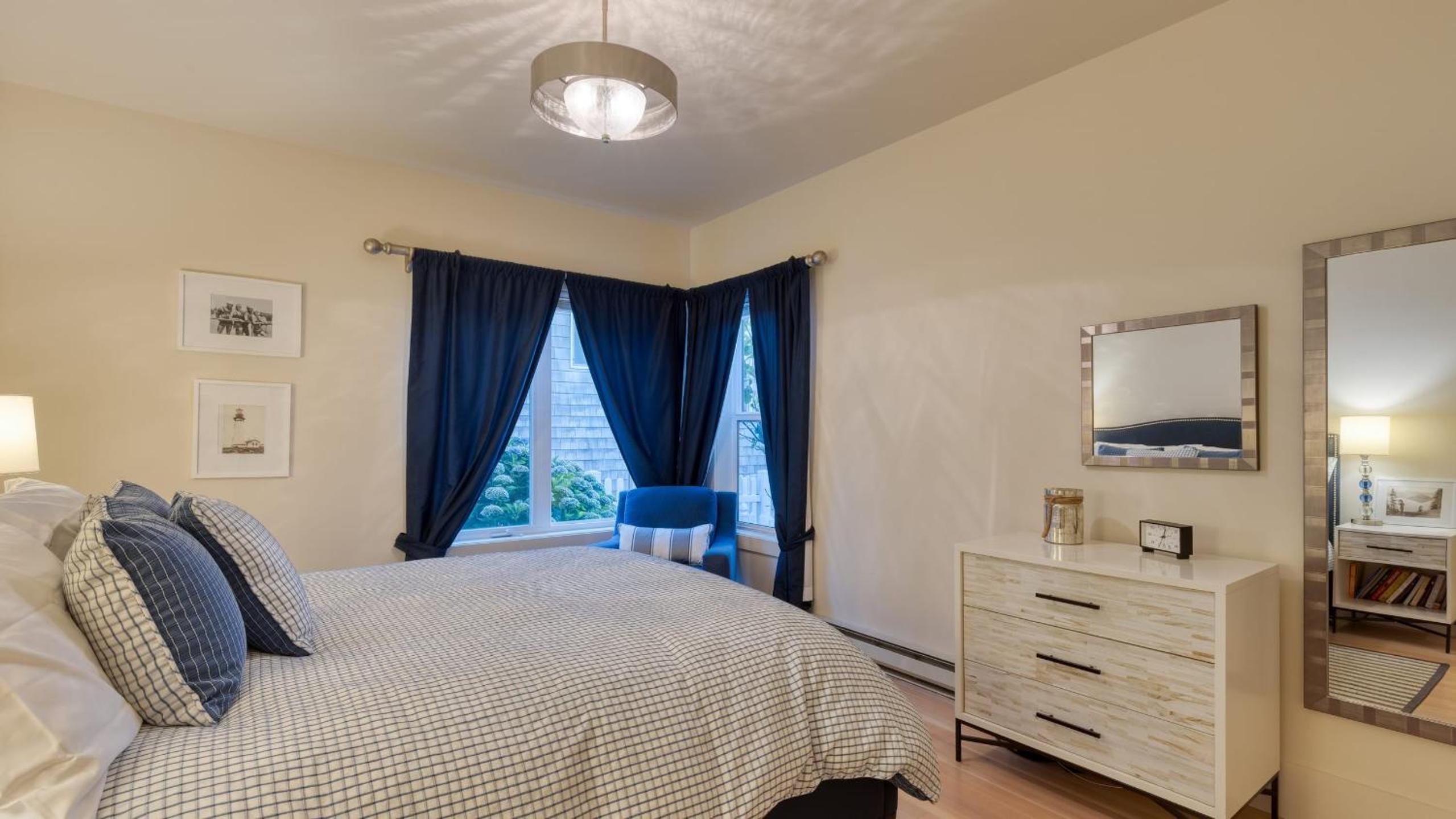 Beachside Retreat w Hot Tub Balcony Dining Blue-Ceiling Charm Sea Cured by AvantStay