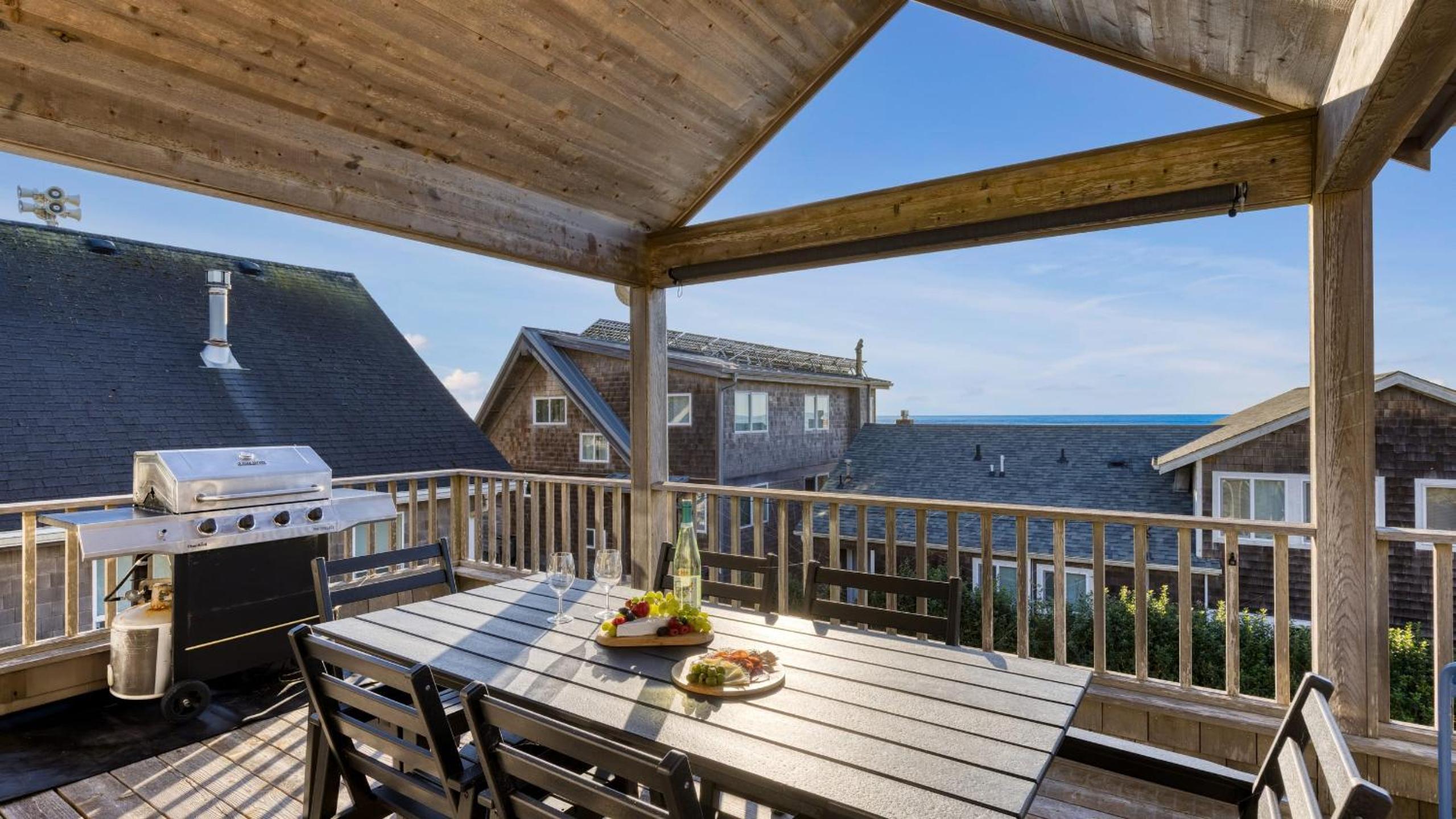 Beachside Retreat w Hot Tub Balcony Dining Blue-Ceiling Charm Sea Cured by AvantStay