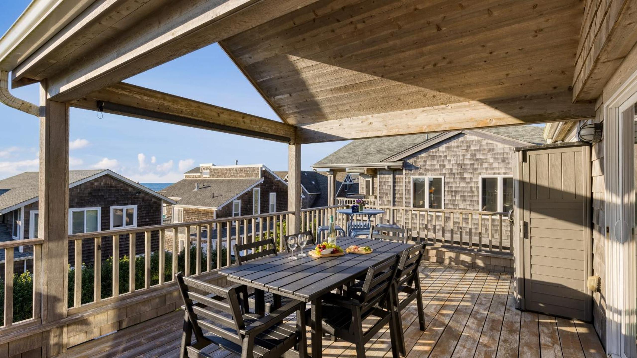 Beachside Retreat w Hot Tub Balcony Dining Blue-Ceiling Charm Sea Cured by AvantStay
