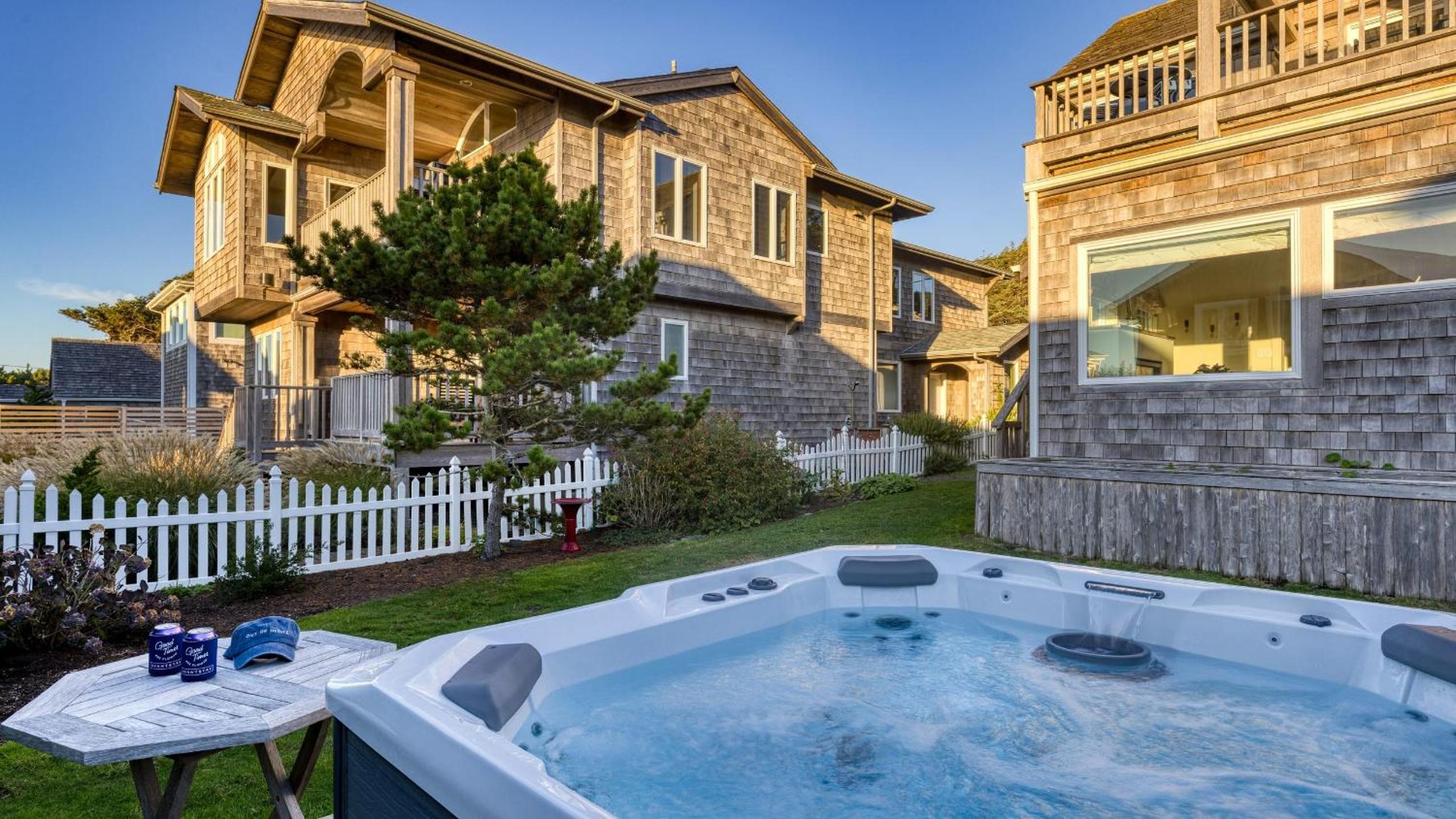 Beachside Retreat w Hot Tub Balcony Dining Blue-Ceiling Charm Sea Cured by AvantStay