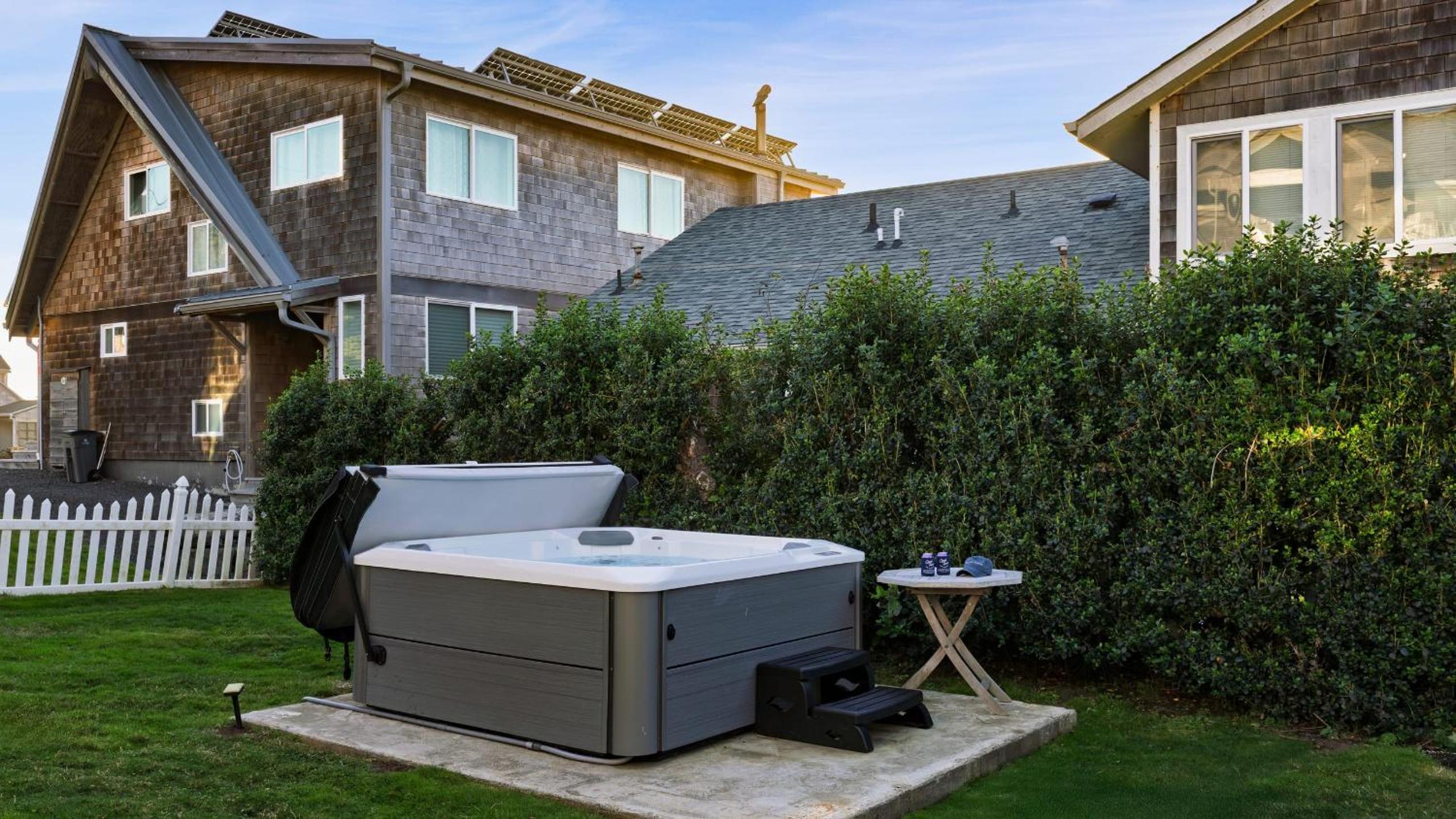 Beachside Retreat w Hot Tub Balcony Dining Blue-Ceiling Charm Sea Cured by AvantStay