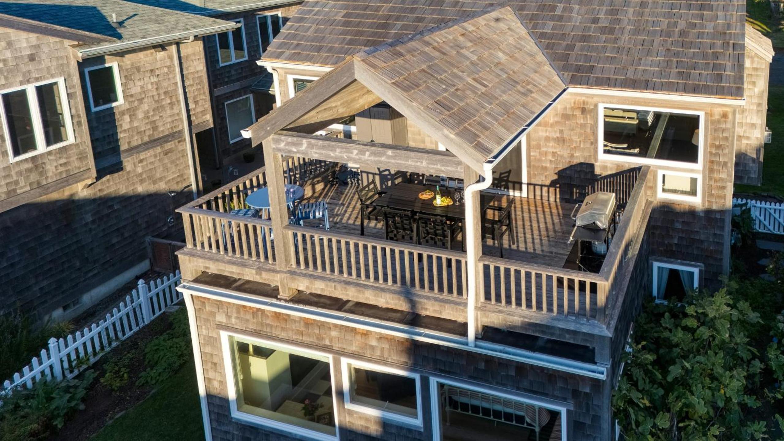 Beachside Retreat w Hot Tub Balcony Dining Blue-Ceiling Charm Sea Cured by AvantStay