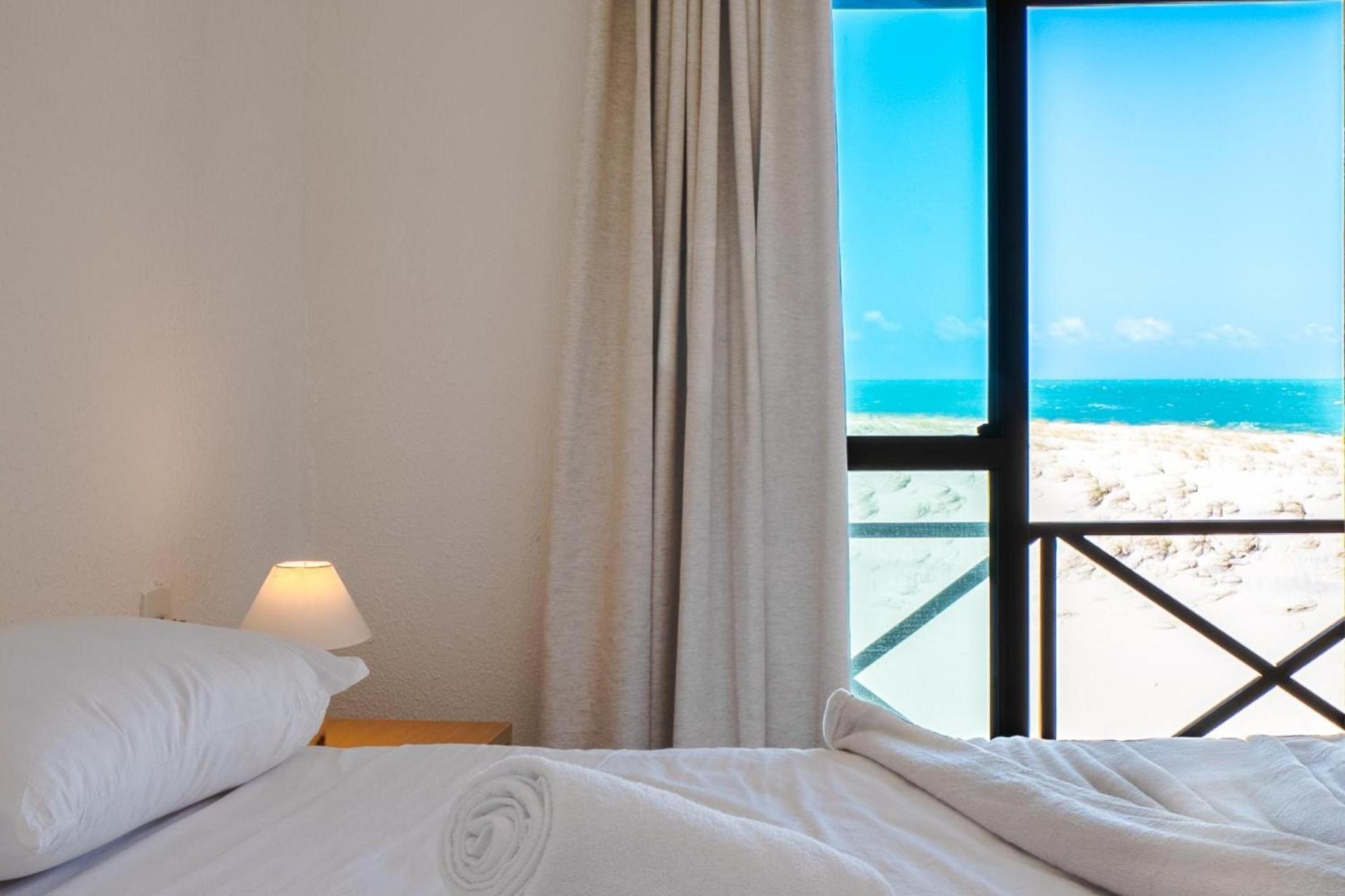 Beachfront Duplex Foot in the Sand By Carpediem